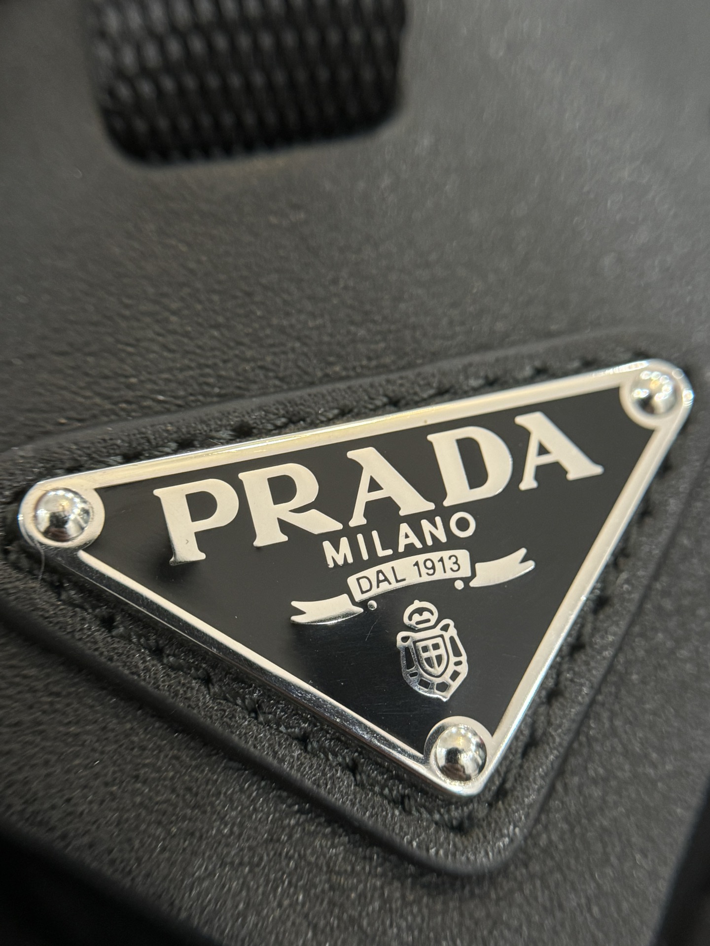 Prada Hardware pull tag details reference
