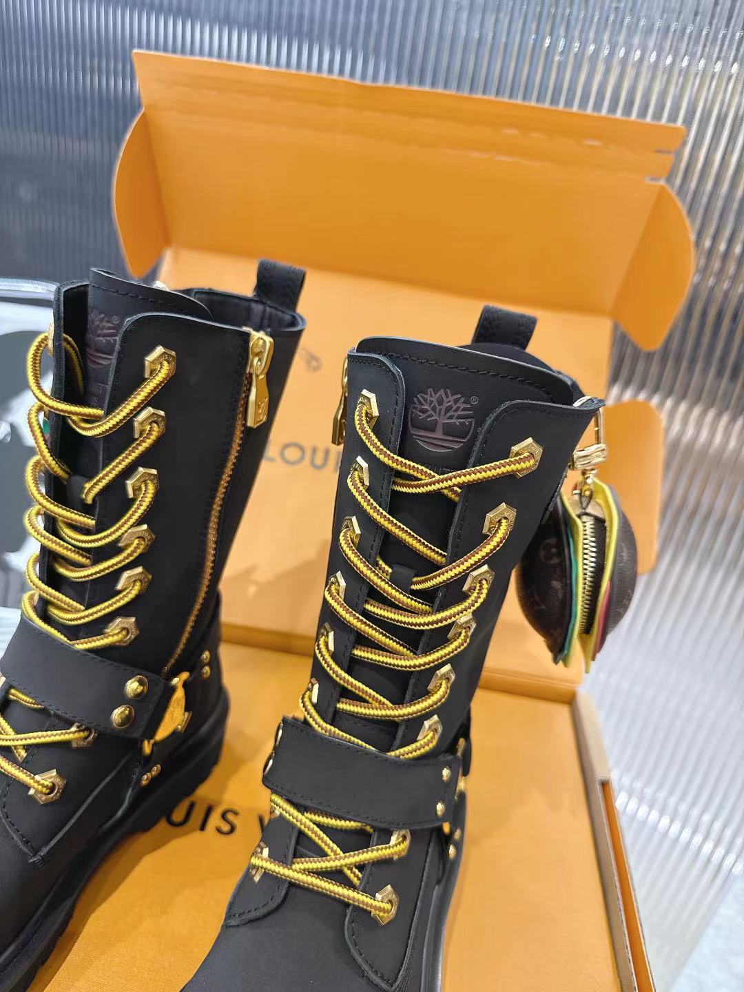 LV x Timberland Black Leather Ankle Boots with Hamburger Charm for Women 8 a1757509279648 4741