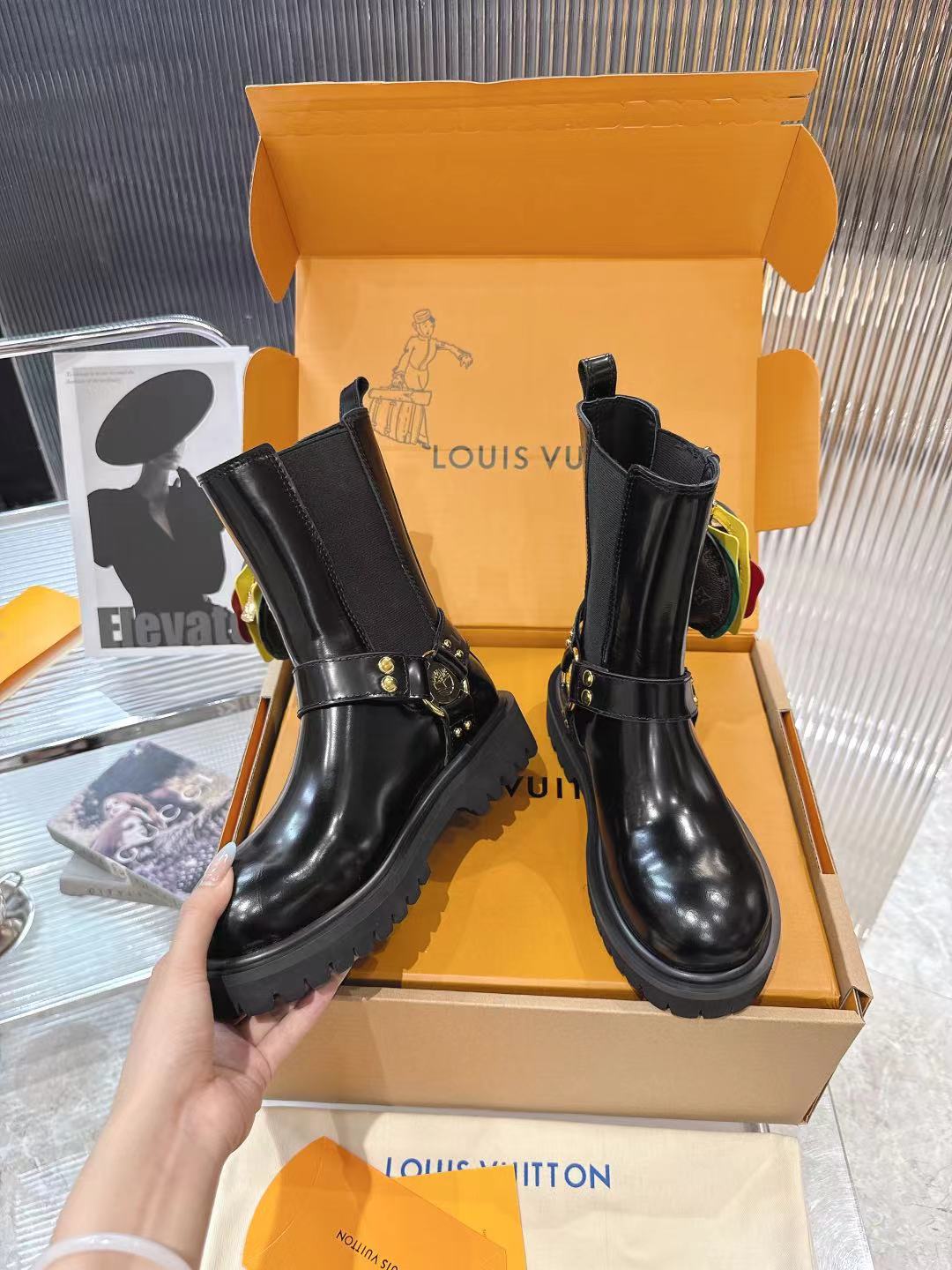 LV x Timberland Collab Black Leather Ankle Boots with Burger Charm 6 a1757509374474 5201