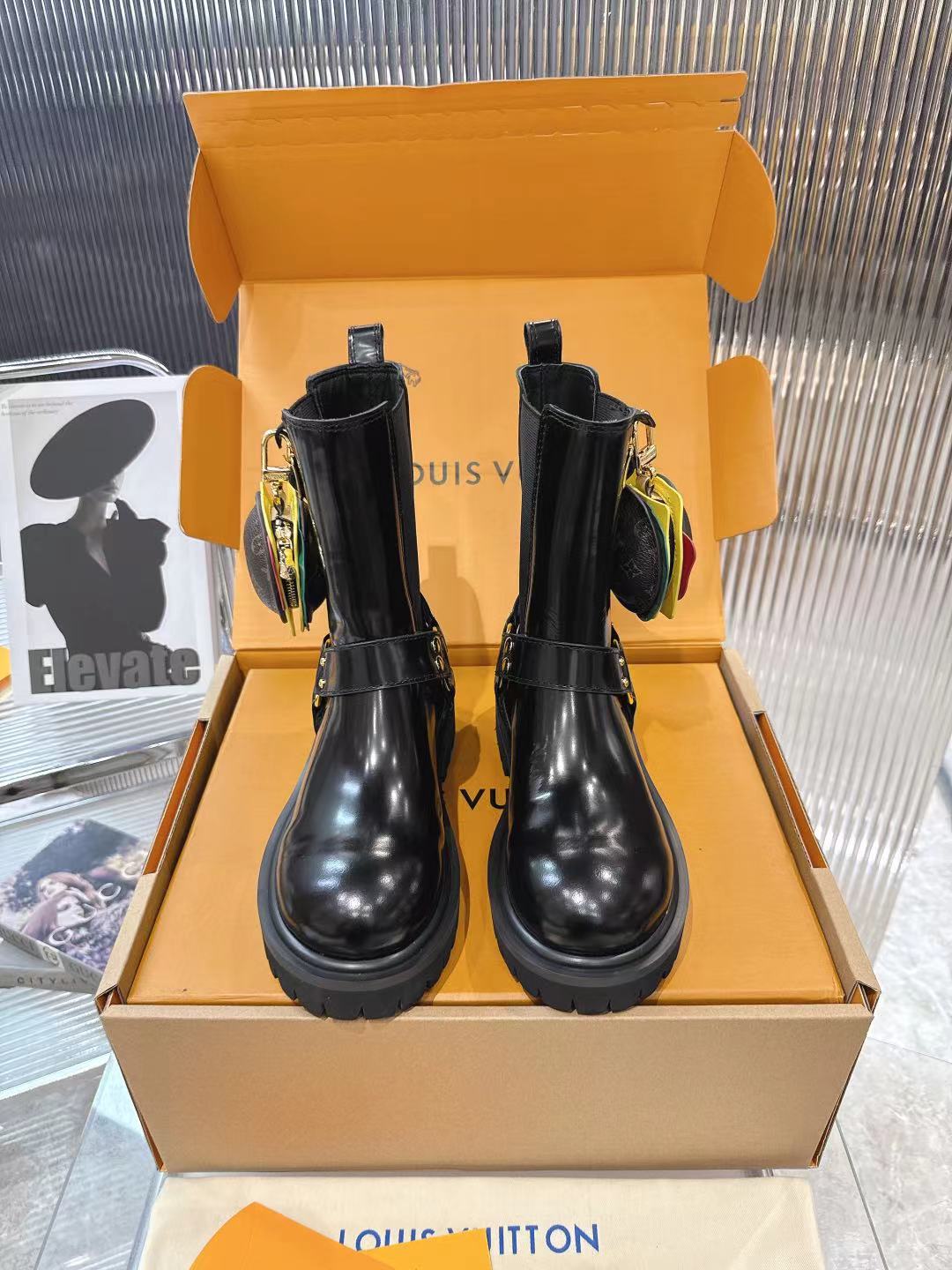 LV x Timberland Collab Black Leather Ankle Boots with Burger Charm 3 a1757509374476 1835