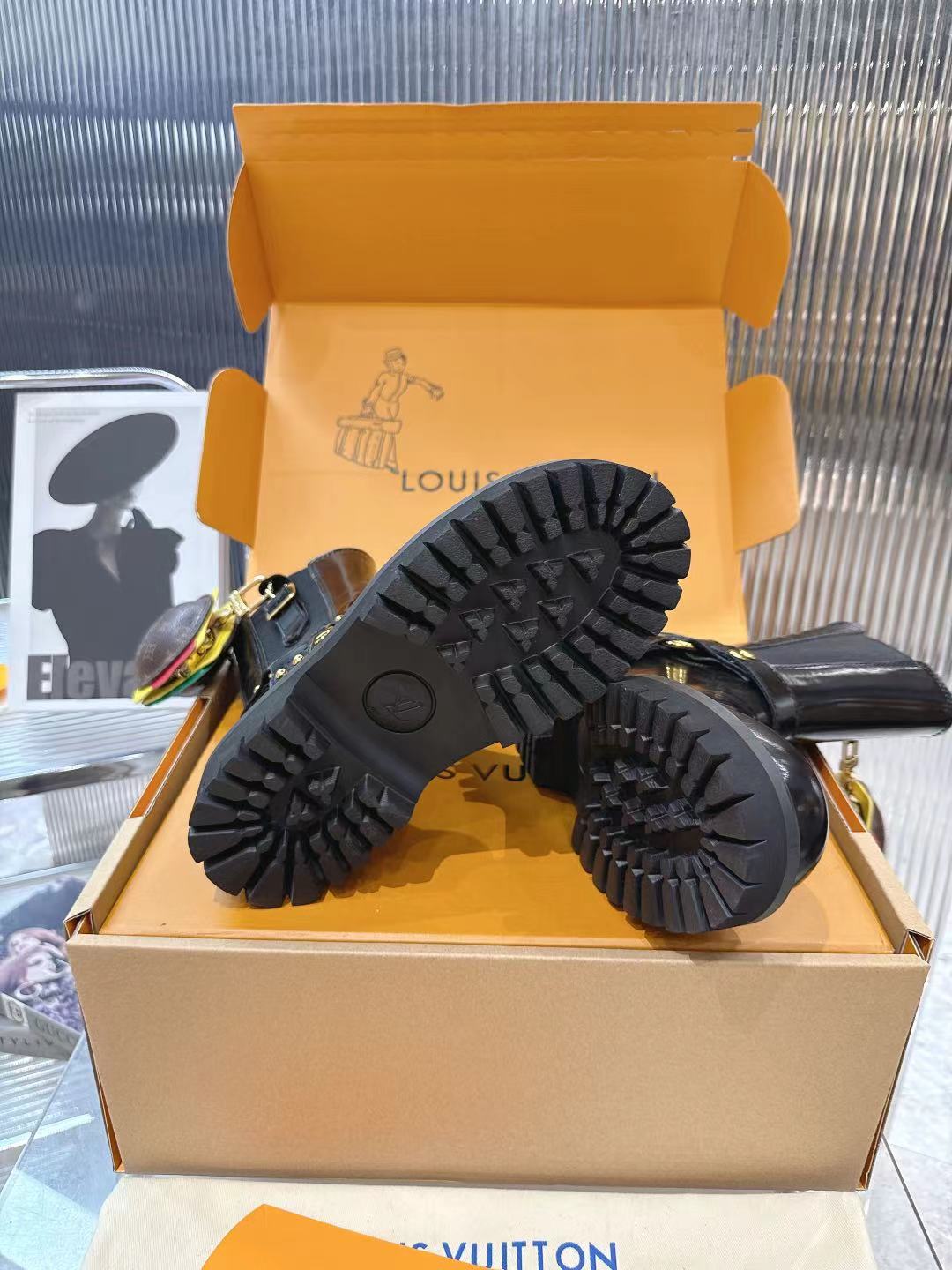 LV x Timberland Collab Black Leather Ankle Boots with Burger Charm 10 a1757509379636 3756