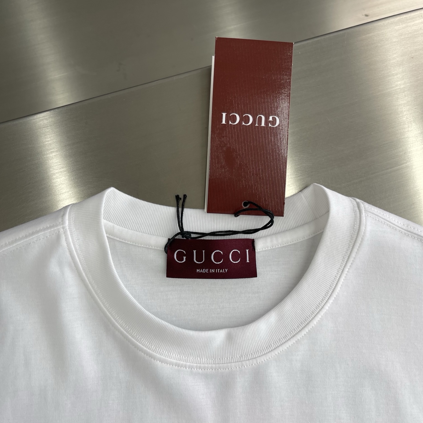 Gucci Embossed Logo T-Shirt - High Quality, Fashionable, and Versatile 5 i1745586075778 2243 0 0