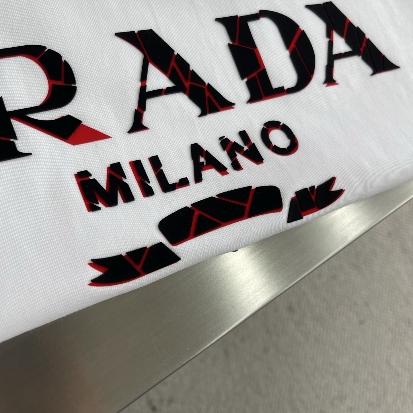 Prada Milano Logo Print Cotton T-Shirt - Unisex, Relaxed Fit 5 i1745678170335 6432 0 2