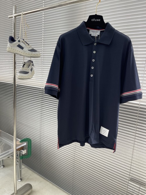 Thom Browne Navy Polo Shirt with Tricolor Armbands | High-Quality Cotton 1 Thom Browne Navy Polo Shirt with Tricolor Armbands | High-Quality Cotton