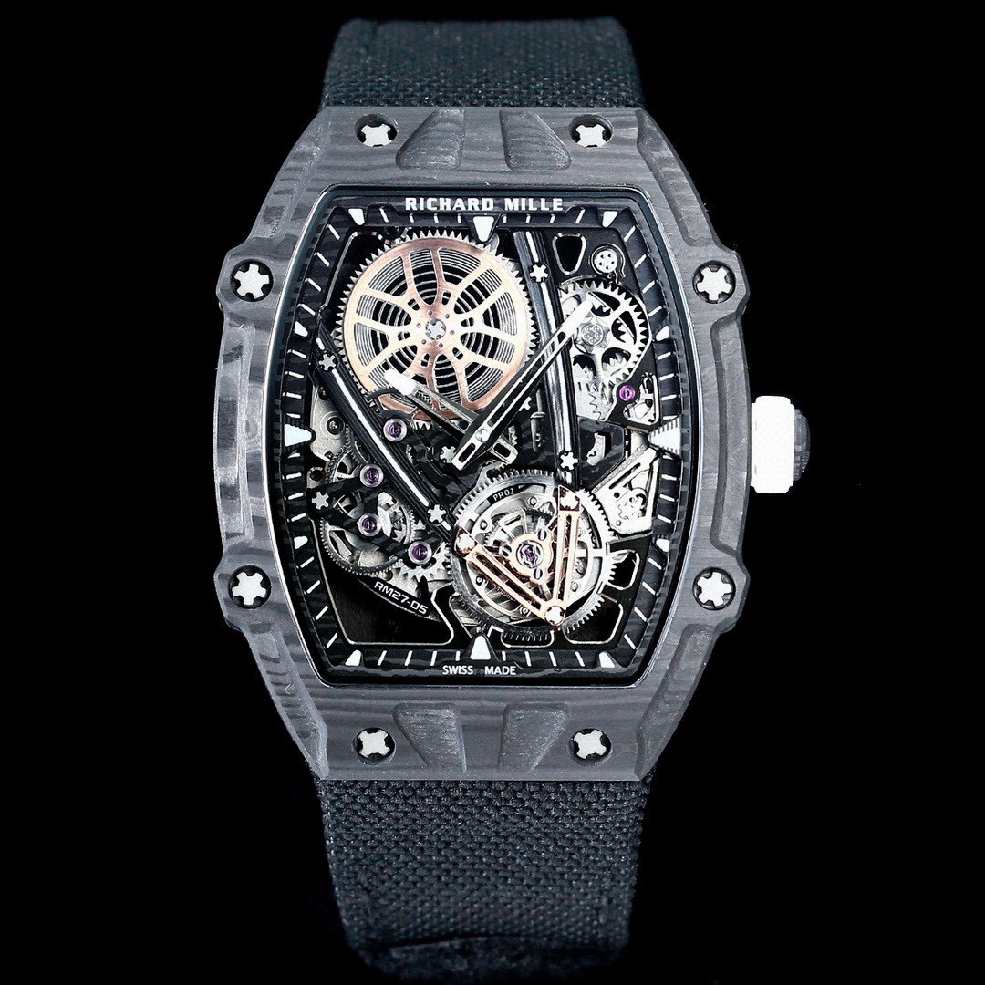NO:553204,Counterweight 38g, thickness 9mm, RICHARD MILLE RM 27-05 Flying Tourbillon Rafael Nadal floating tourbillon watch - ultra-light and ultra-thin. The entire watch weighs only 38g (including strap), and the case thickness is only about 9 mm. The entire watch size is 37.25×47.25×9mm. RICHARD MILLE just met the famous tennis player Rafael Nadal.  Launching an amazing new joint product - 'RM 27-05 Flying Tourbillon Rafael'   Nadal' floating tourbillon watch, the entire watch is ultra-light and can withstand acceleration shocks of up to 14,000g. It is the lightest and strongest tourbillon watch in the world so far. This RM 27-05 took 5 years to develop a new carbon fiber composite material-'Carbon TT B.4'. This high-tech material is lighter than conventional Carbon TT  The density is increased by 4, the fiber hardness is increased by 15, and the resin strength is increased by 30. The material structure is anisotropically optimized to remain light and extremely tough, providing the strongest impact resistance of this series so far. The new watch mirror uses MMA ultra-light polymer to replace the traditional sapphire crystal, making the entire watch lighter in weight while providing higher transparency and anti-glare performance.   The fully open hollow dial directly presents the unique geometric mechanical aesthetics - the V-shaped bridge plate and the tourbillon splint form a striking visual impact, the hollow barrel directly shows the winding status, the 2 o'clock is the winding gear system, and the 8 o'clock gear system is stacked to form a perfect connection.19860909配重38g 厚度9mm RICHARD MILLE 理查米尔 RM 27-05 Flying Tourbillon Rafael Nadal 浮动陀飞轮腕表———超轻、超薄 整枚腕表重量仅38g（含表带）,表壳厚度仅约为9 mm 整表尺寸37.25× 47.25× 9mm RICHARD MILLE 刚刚与著名网球运动员 Rafael Nadal 推出一枚让人惊叹的联名新作——「RM 27-05 Flying Tourbillon Rafael Nadal」浮动陀飞轮腕表,整枚表重量超轻,能够承受高达14000g加速度冲击,是全球迄今最轻盈、最坚固的陀飞轮腕表. 这枚 RM 27-05 耗时5年研发全新碳纤维复合材料——「Carbon TT B.4」打造,这种高科技材料比常规 Carbon TT 密度提高4,纤维硬度提升15,树脂强度提升30,材料结构经过各向异性优化,保持轻盈同时无比坚韧,提供迄今该系列最强的抗冲击性能. 新作表镜采用 MMA 超轻聚合物取代传统的蓝宝石水晶,让整枚腕表的重量得以轻盈,同时提供更高的透明度和防眩光性能. 全开放镂空表盘直接呈现出独特的几何机械美学——V形桥板与陀飞轮夹板构成醒目的视觉冲击力,镂空发条盒直接呈现上链状况,2点为上链齿轮组系,8点齿轮组系层叠构成完美衔接.,,Watch
