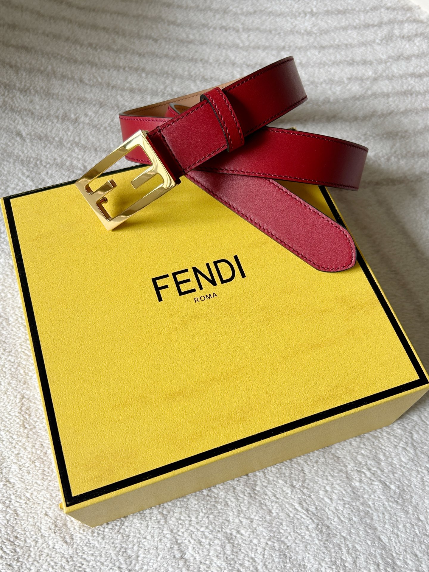 “Ms. Findl’s Classic Double-F Button Belt: High-Quality Fashion with Style”