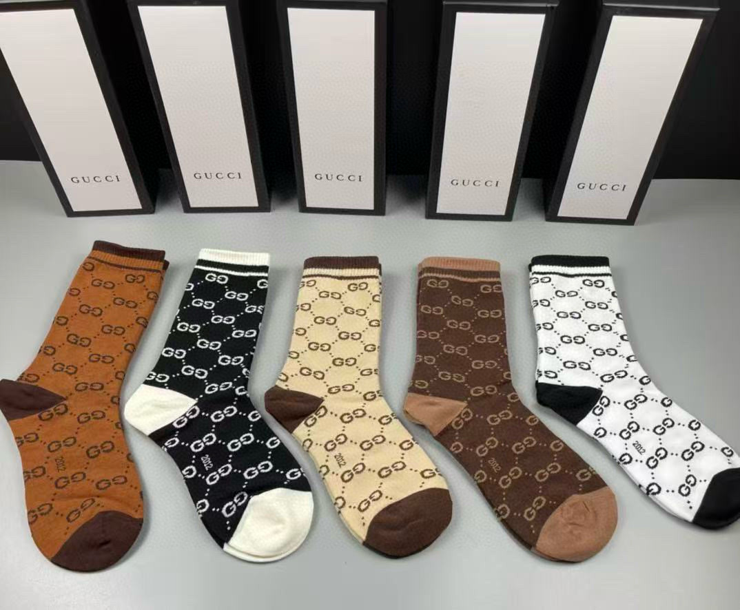 NO:719434,Gucci · Gucci's new long socks [five pairs in a box] classic double G logo, especially tall, pure cotton material, breathable and comfortable, versatile for sports and leisure, ins super popular small item, big name outing, fashionable people must have super good socks, stockings, socks, gucci, gucci, socks19860909 Gucci · 古奇大G家新品长筒袜子【一盒五双】经典双G标志,特显高大上,纯棉材质,透气舒适,运动休闲百搭款,ins超火爆小单品,大牌出街,潮人必备超好搭袜子,丝袜,袜子,gucci,gucci,socks,accessory