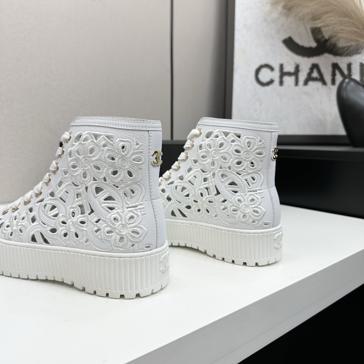 Chanel White Leather Floral Embroidered High-Top Sneakers 7 i1758318515209 580 0 5