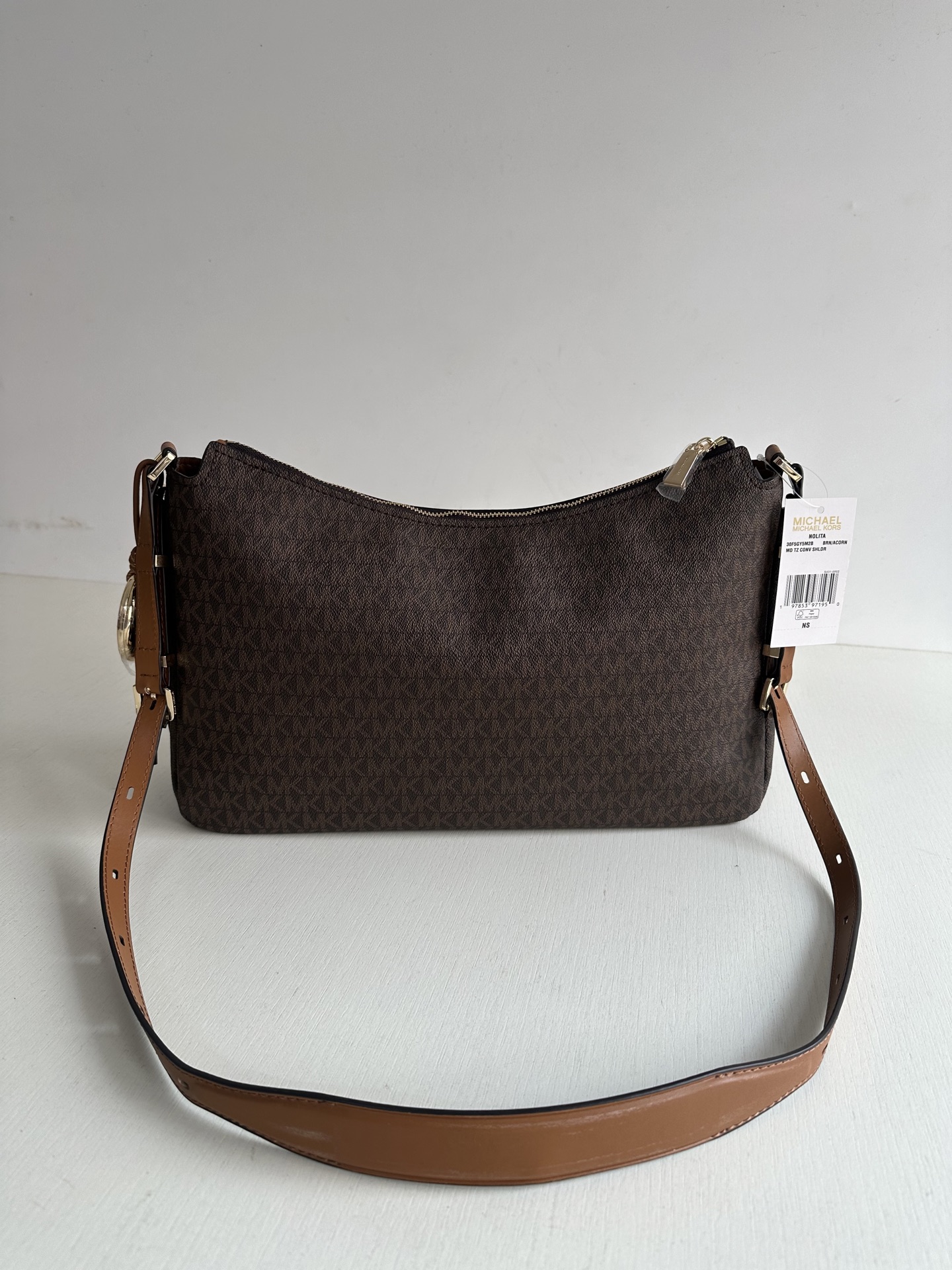 Michael Kors mk新款Nolita系列Michael kors 中号pvc配皮单肩包，腋下包，斜挎包 尺寸：39×25×10