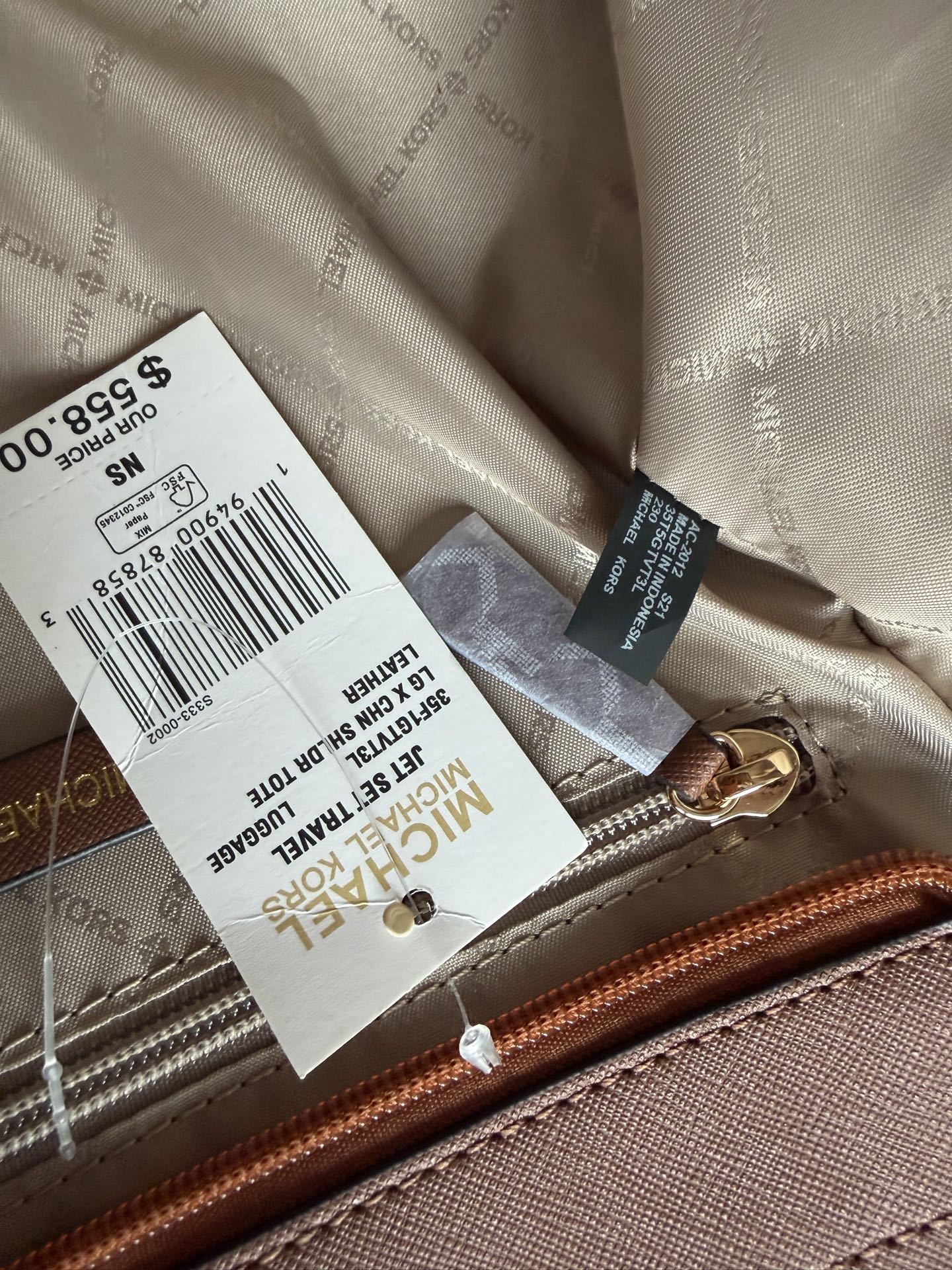 原单340
mk新款JET SET TRAVEL系列妈咪购物袋，尺寸:底长27上宽39&times;26&times;11