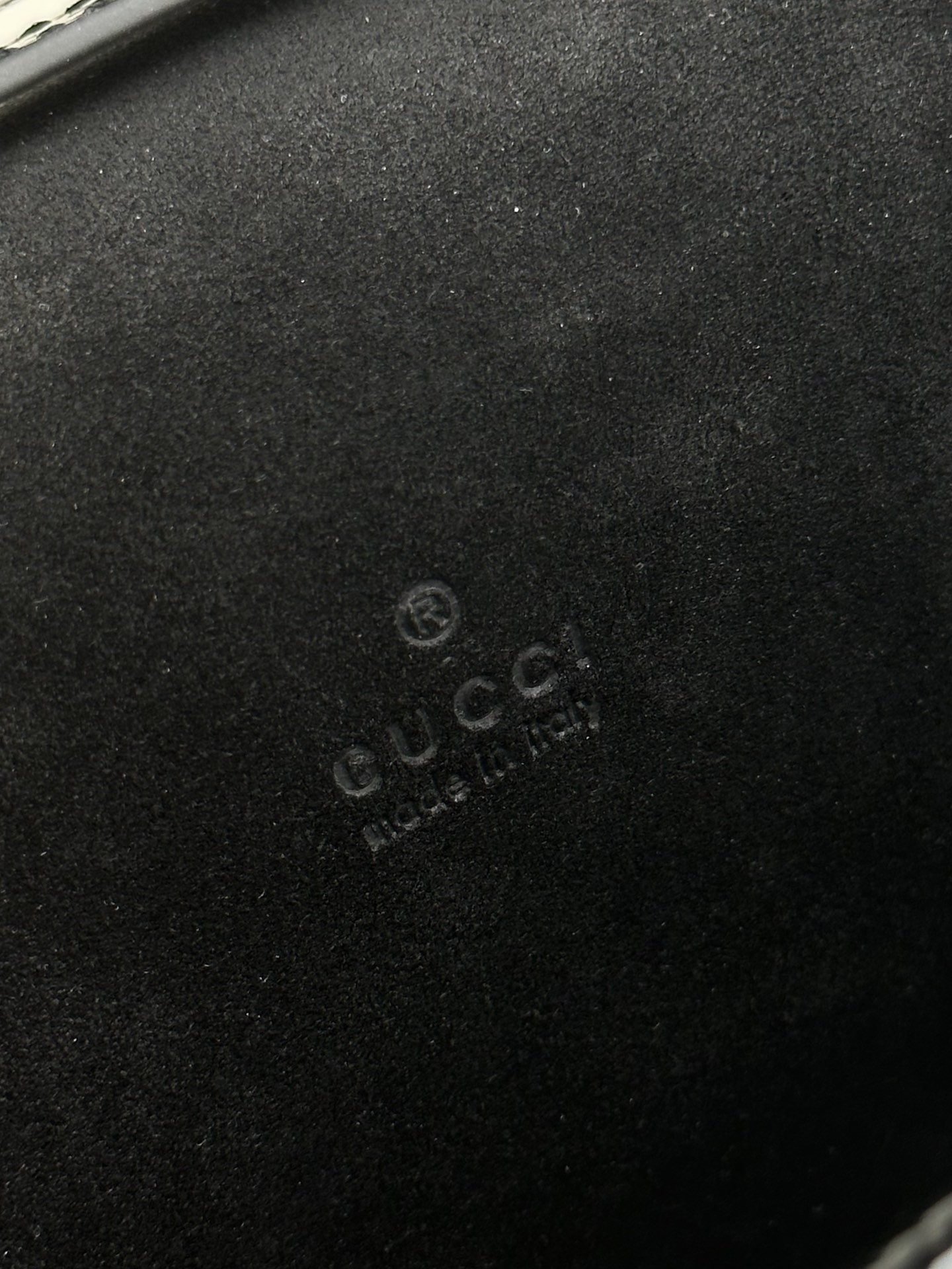 Gucci Stamped logounique anti-counterfeiting code!