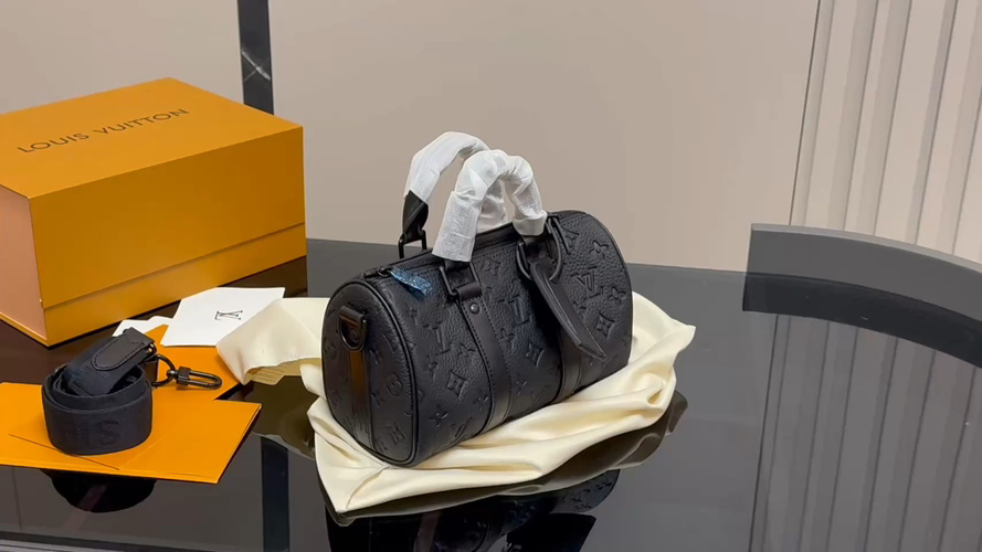 Louis Vuitton Black Leather Embossed Monogram Keepall XS Bandouliere Bag 1 Louis Vuitton Black Leather Embossed Monogram Keepall XS Bandouliere Bag