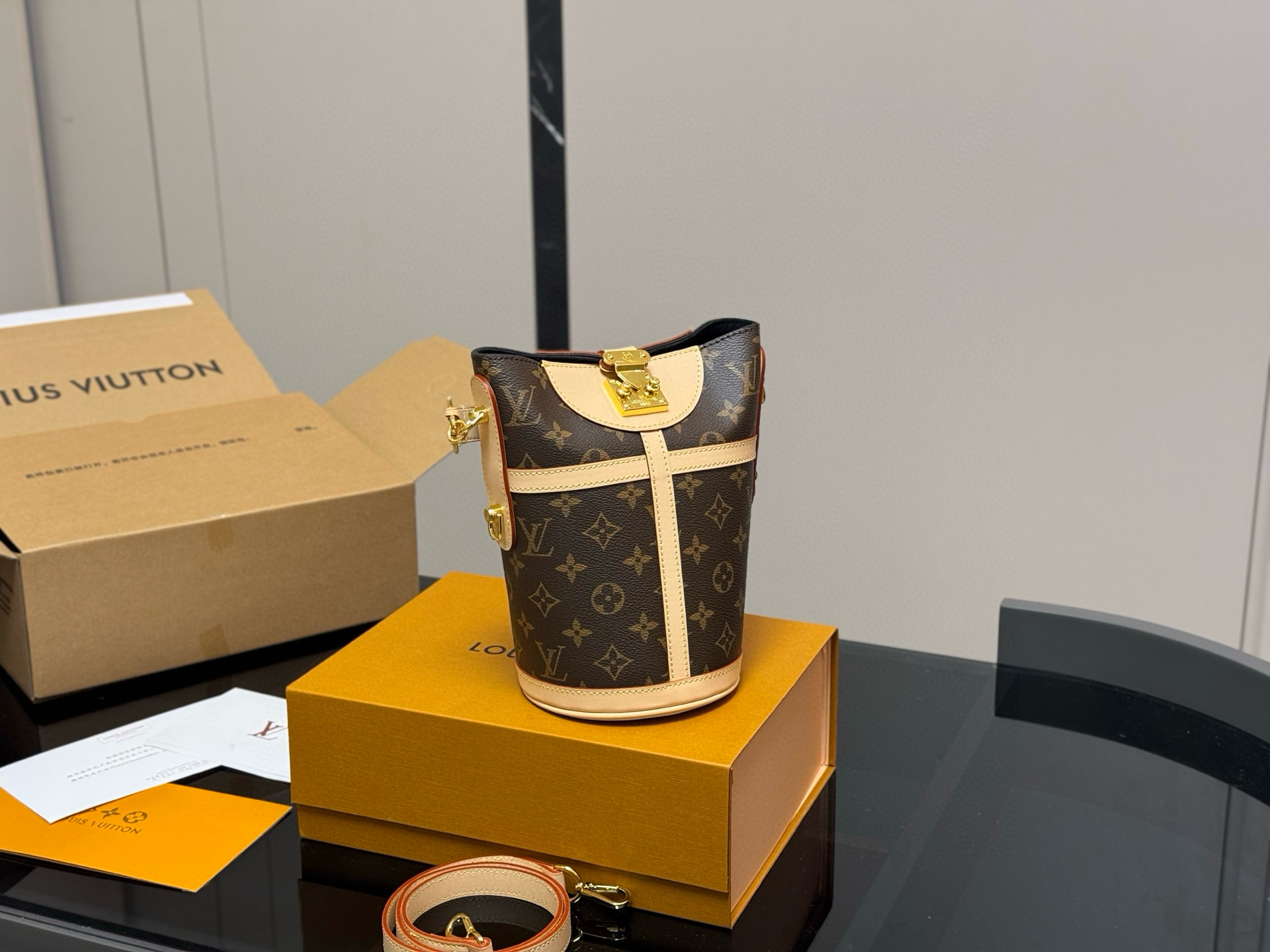 Louis Vuitton Duffle Bag with Patina Leather Trim - Stylish & Durable