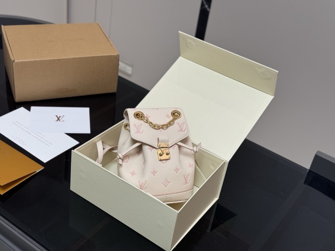 Louis Vuitton Pink Mini Backpack, Multi-Wear Options, Perfect for Essentials 1 Louis Vuitton Pink Mini Backpack, Multi-Wear Options, Perfect for Essentials