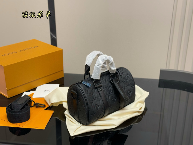 Louis Vuitton Keepall 25 Black Leather Duffle Bag for Men and Women 1 Louis Vuitton Keepall 25 Black Leather Duffle Bag for Men and Women