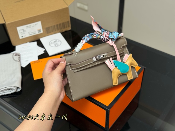 Hermes Kelly 1 Mini Swift Leather Handbag with Pegasus Charm and Silk Ribbon 1 Hermes Kelly 1 Mini Swift Leather Handbag with Pegasus Charm and Silk Ribbon