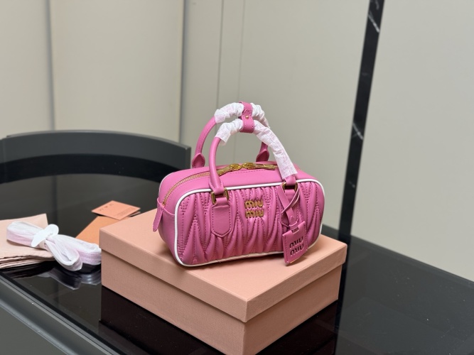Miu Miu Bowling Bag in Pink Leather with Top Handle and Crossbody Strap 1 Miu Miu Bowling Bag in Pink Leather with Top Handle and Crossbody Strap