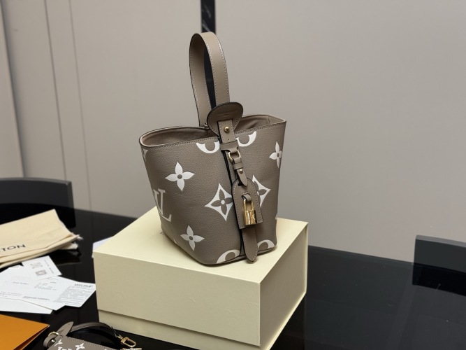Louis Vuitton Onthego PM Bucket Bag Monogram Empreinte Leather Grey 1 Louis Vuitton Onthego PM Bucket Bag Monogram Empreinte Leather Grey