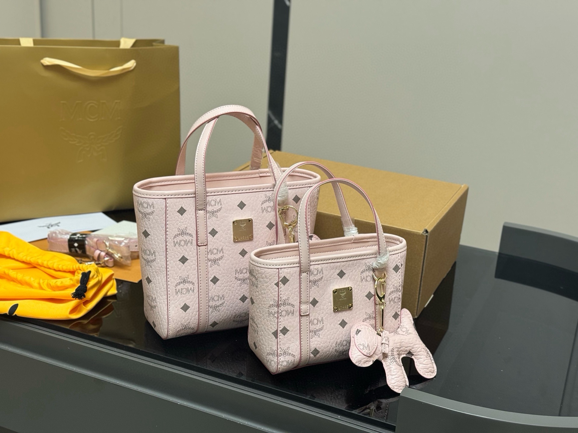 MCM Replica Basket Bag with Dog Charm - Chic and Versatile Tote