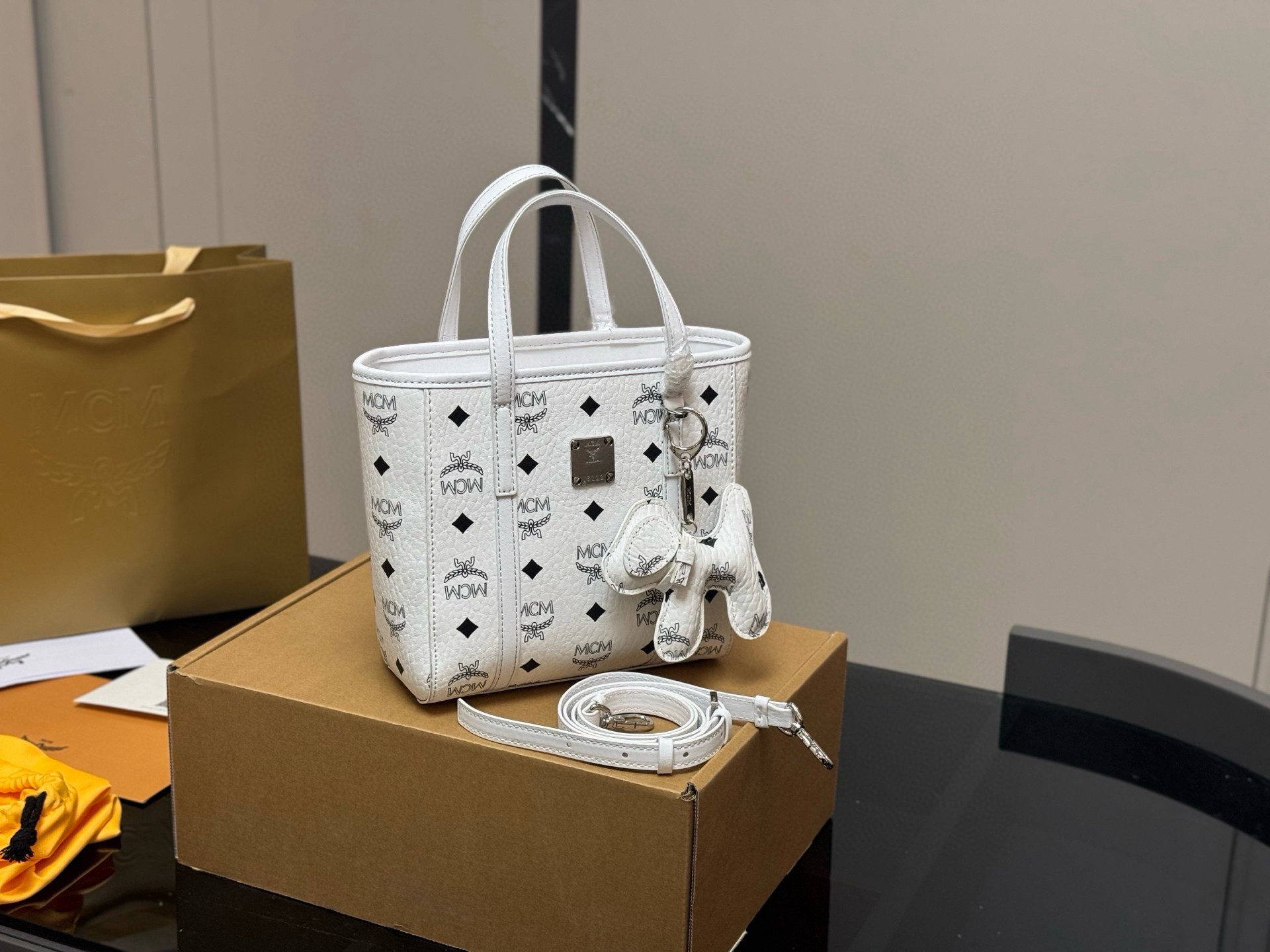MCM White Printed Leather Mini Basket Tote Bag with Dog Charm