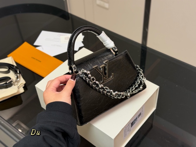 Louis Vuitton Capucines Mini Black Taurillon Leather Top Handle Bag 22cm 1 Louis Vuitton Capucines Mini Black Taurillon Leather Top Handle Bag 22cm