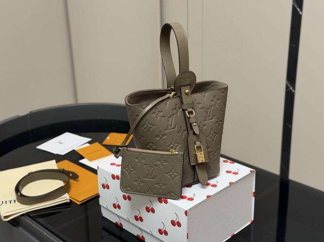 Authentic Louis Vuitton Embossed Leather Bucket Bag with Card Holder