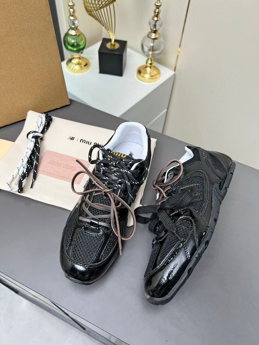 Miu Miu x New Balance 530 Black Patent Leather & Mesh Sneakers 3 i1735559603832 8652 0 2
