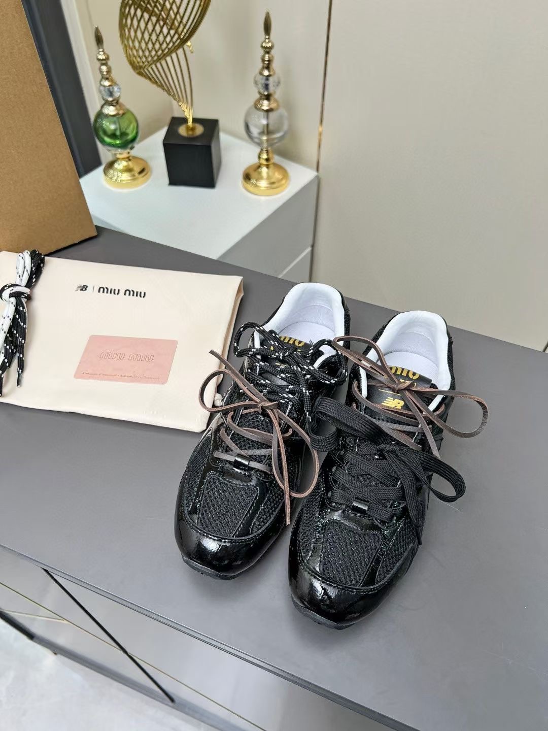 Miu Miu x New Balance 530 Black Patent Leather & Mesh Sneakers 4 i1735559603832 9877 0 3