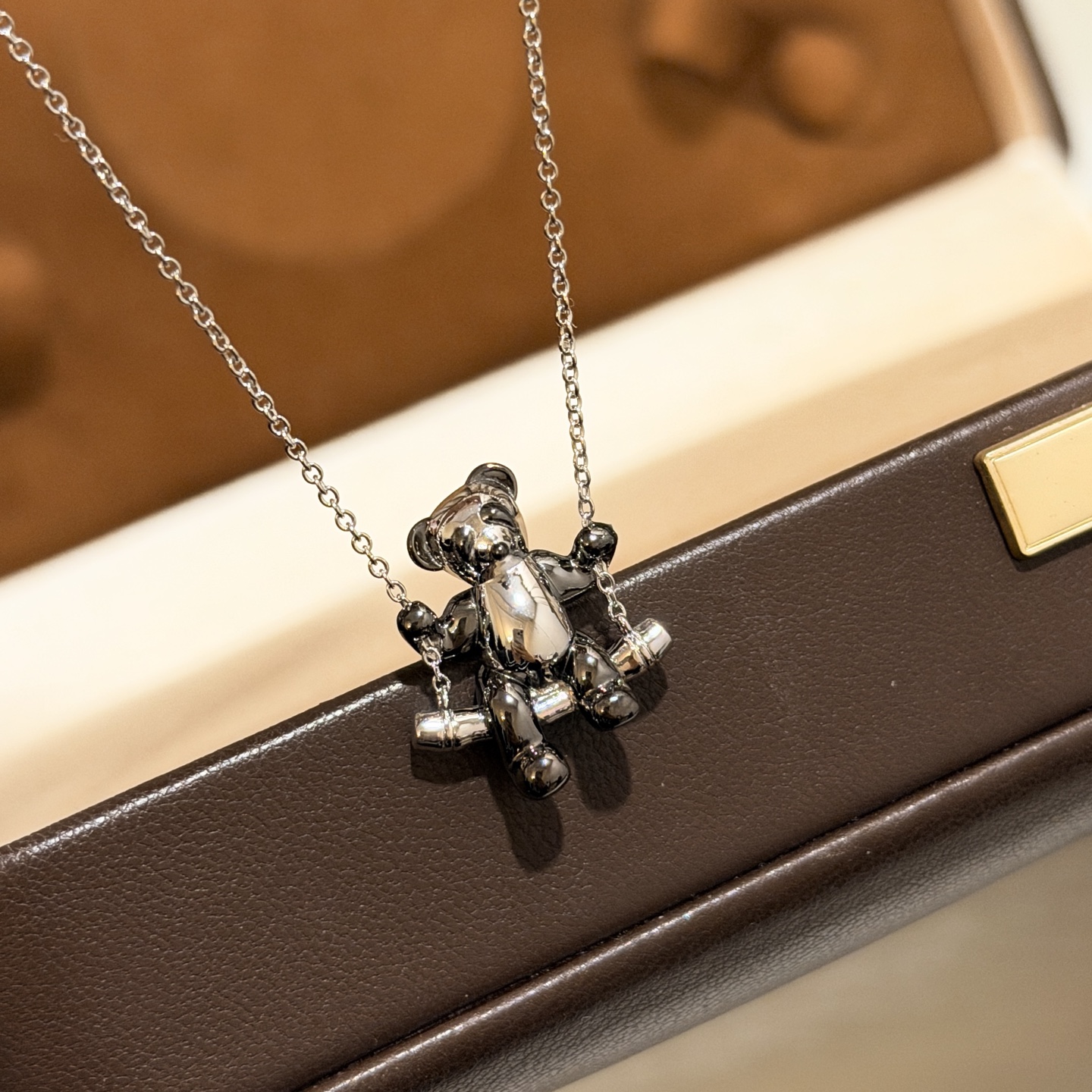 Qeelin Kirin High Jewelry Charity Panda Swing necklace 925 sterling silver with black rhodium plated panda detailing black and white glossy finish 42cm