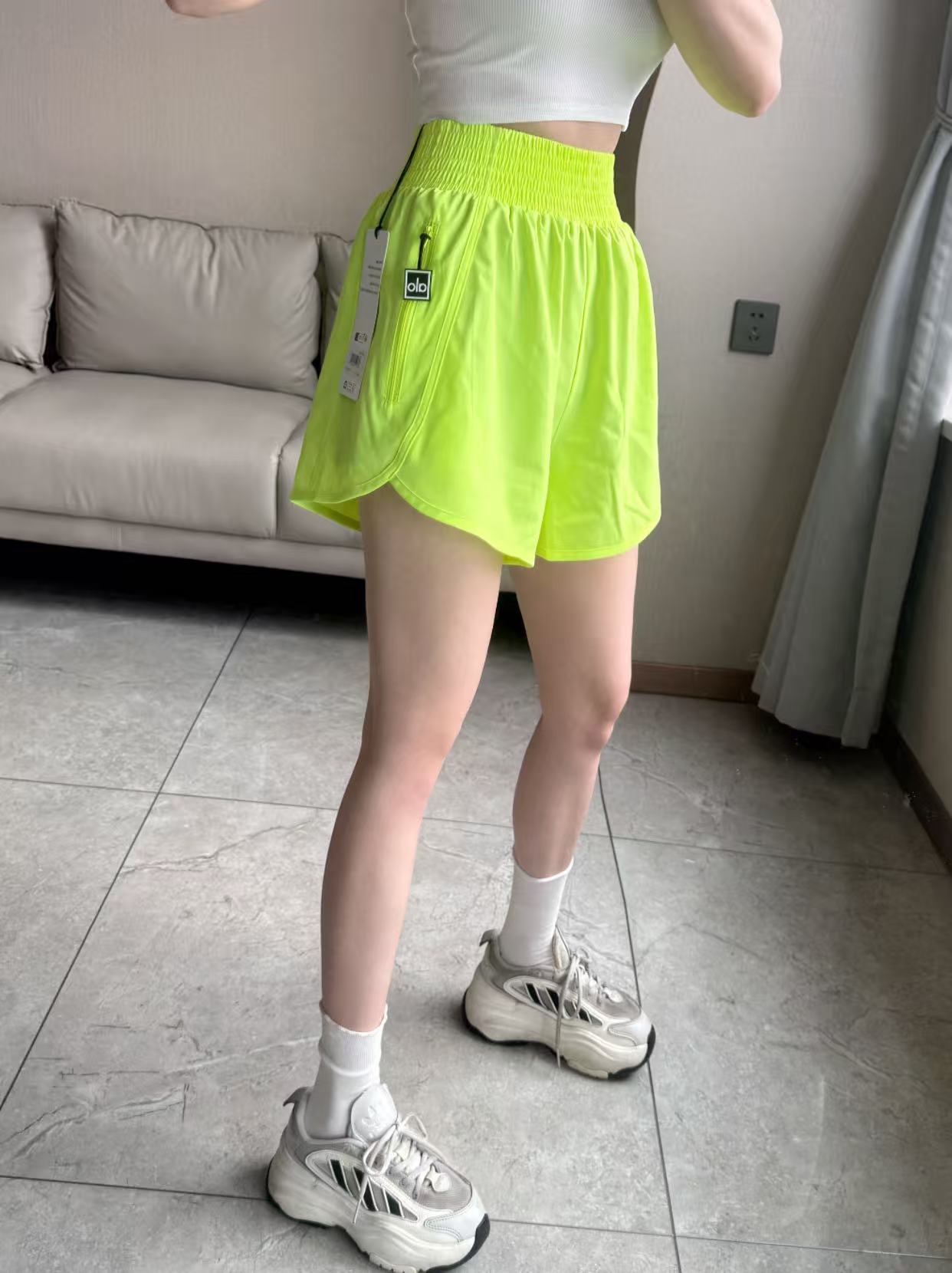 Alo shorts run neon yellow