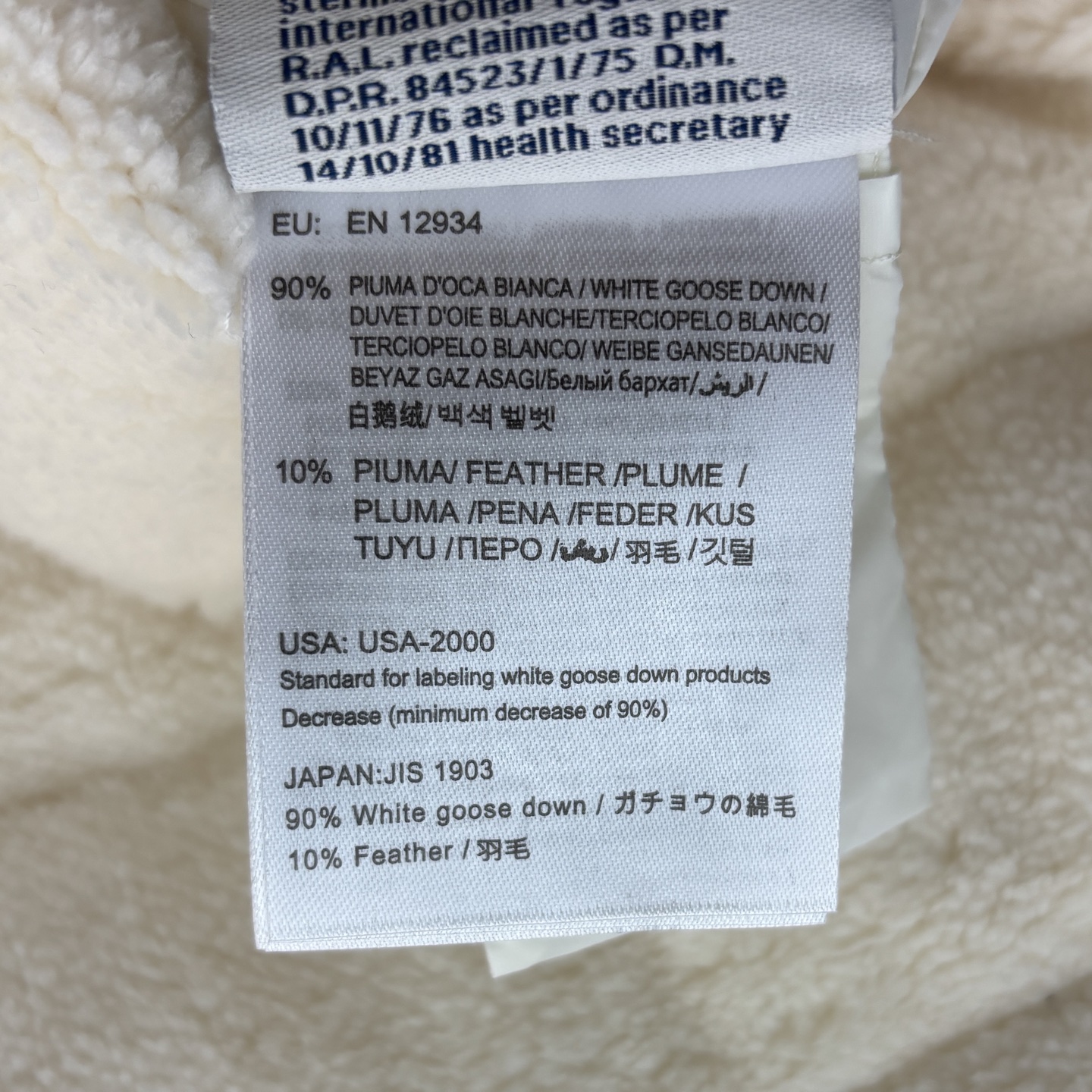 Mo25秋冬 羊卷小颗粒拼接羊毛针织袖立领羽绒服外套  经典的标志性袖标点缀 90白鹅绒填充  经典百搭