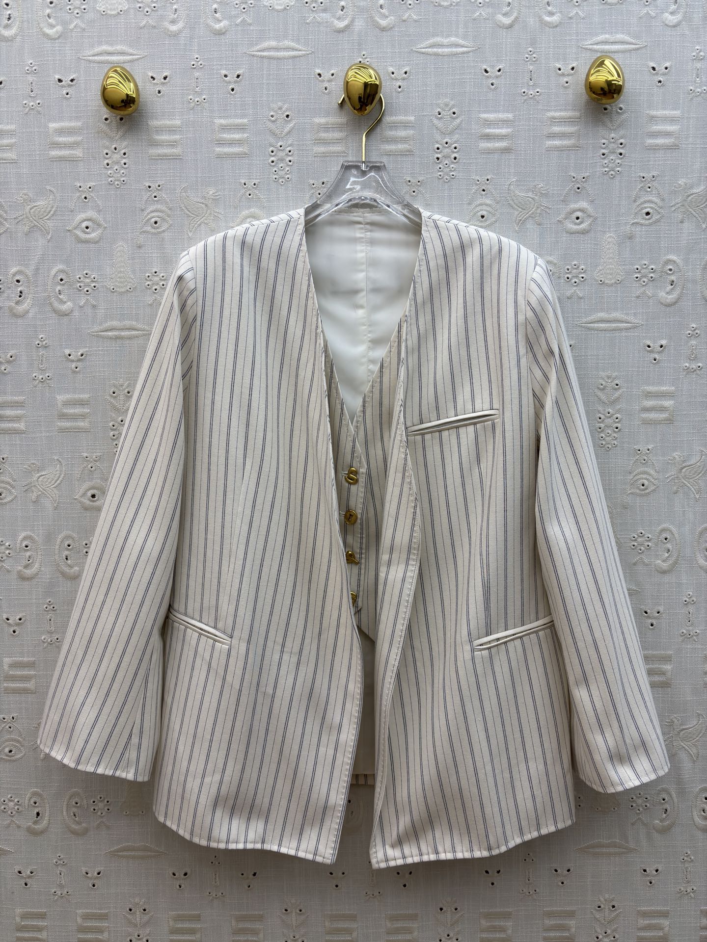 Striped Blazer with Irregular Button Design – Stylish and Comfortable