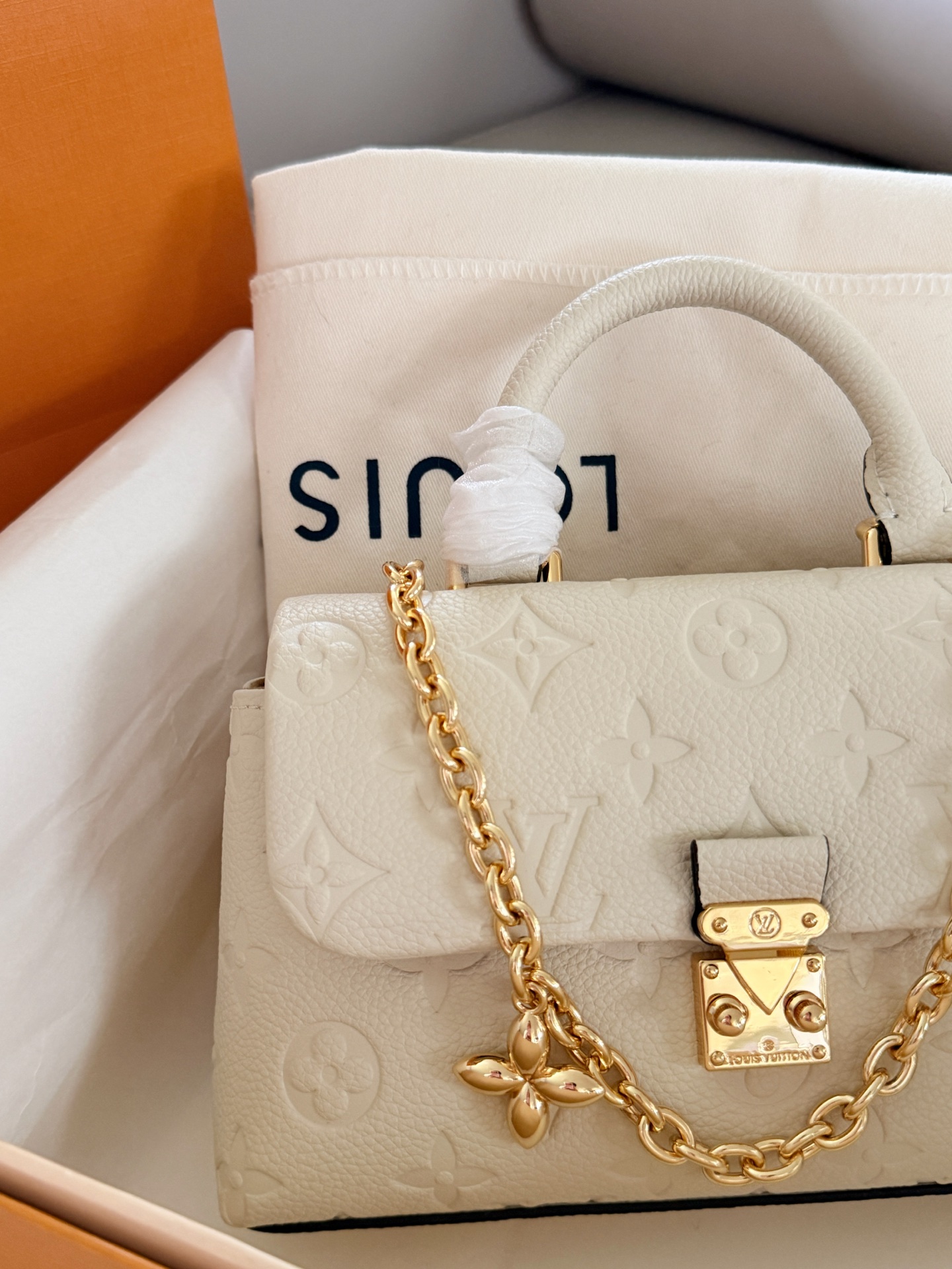 Louis Vuitton Madeleine Cream Monogram Empreinte leather mini shoulder