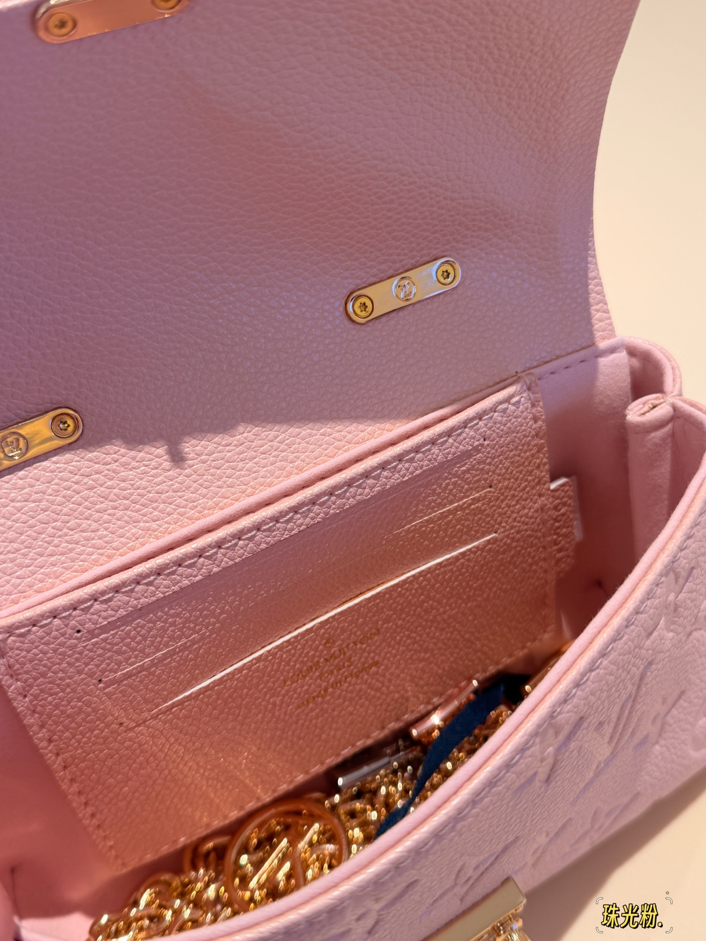 Louis Vuitton Nano Madeleine Pearl Pink Monogram Empreinte Leather mini crossbody