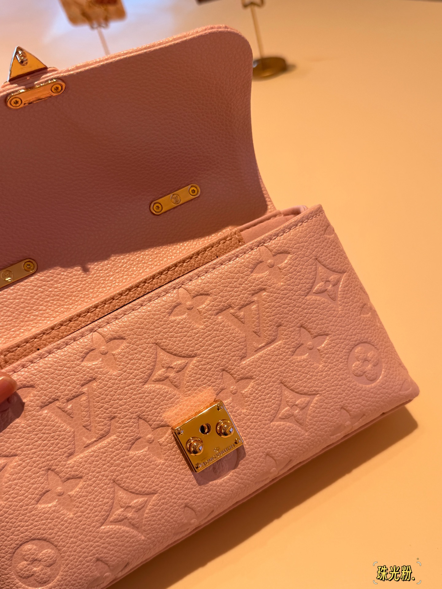 Louis Vuitton Nano Madeleine Pearl Pink Monogram Empreinte Leather mini crossbody