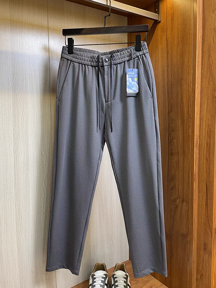 Luxurious and Classy Spring/Summer Thongs by AMANI: Comfortable, Stylish, Tailored Pants with Silver Detail.