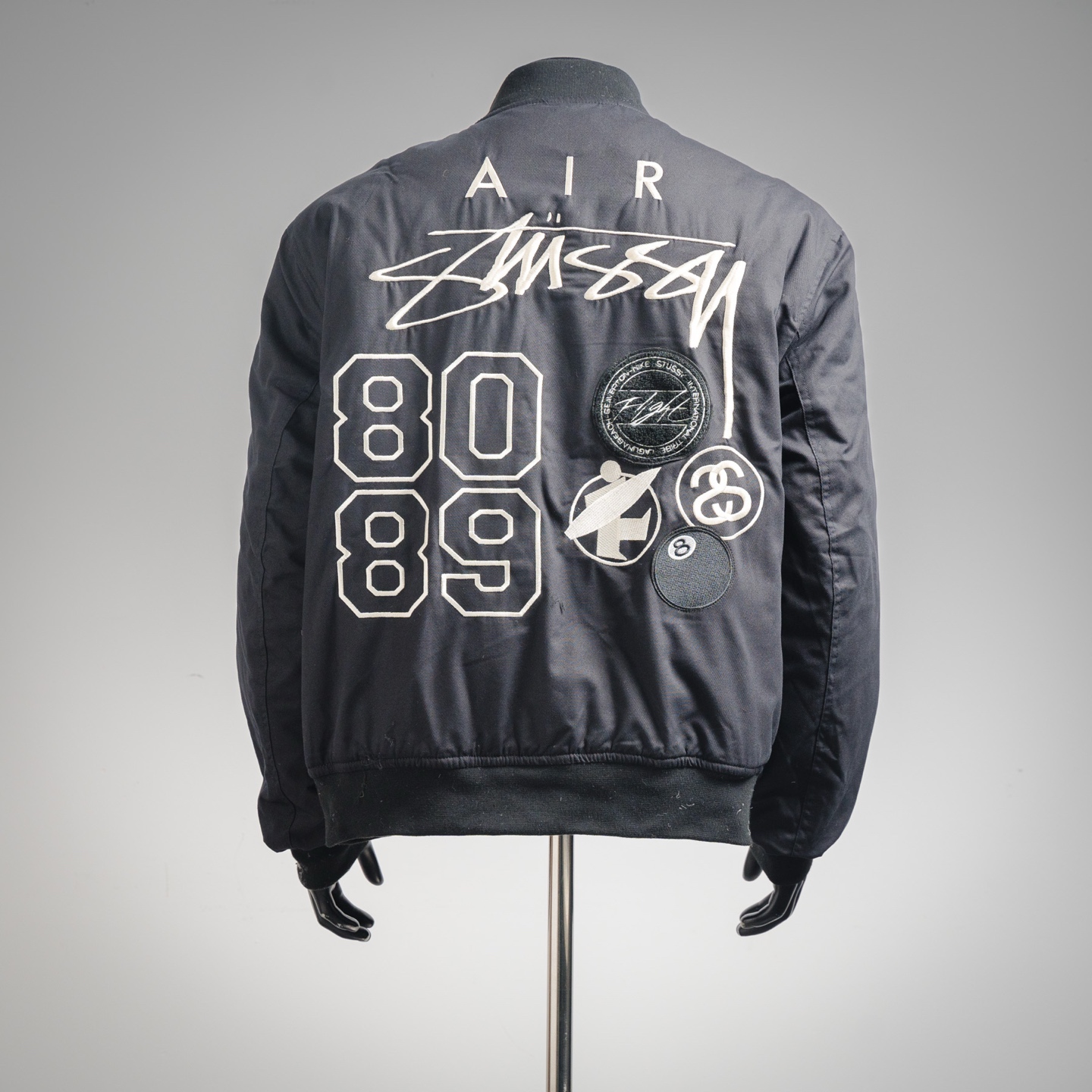 Nike x Stussy 斯图西联名款 FW23 Logo刺绣双面穿夹克外套军绿色 橘色内里 / 黑色 白色内里