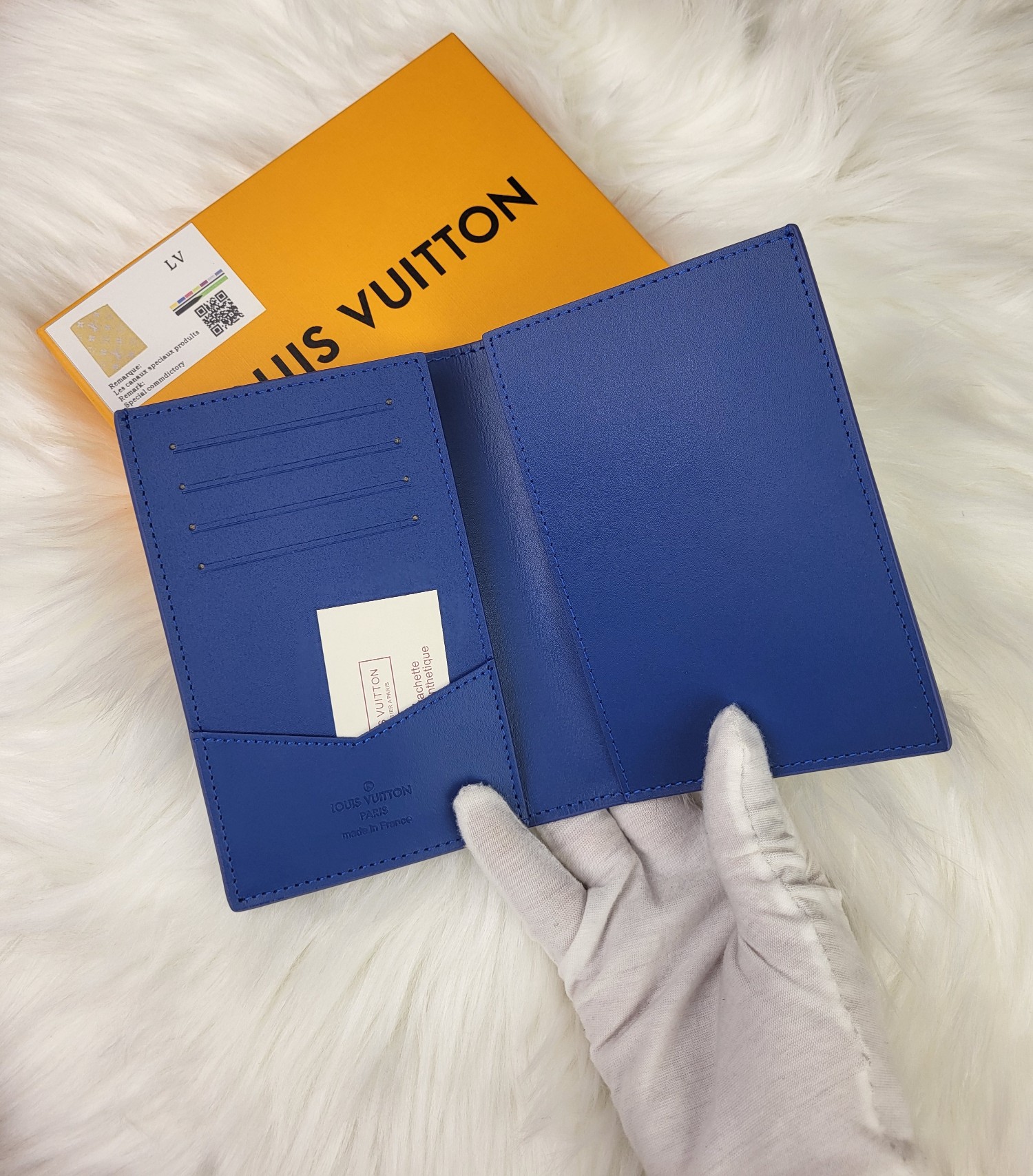 Close-up of leather passport holder stitching