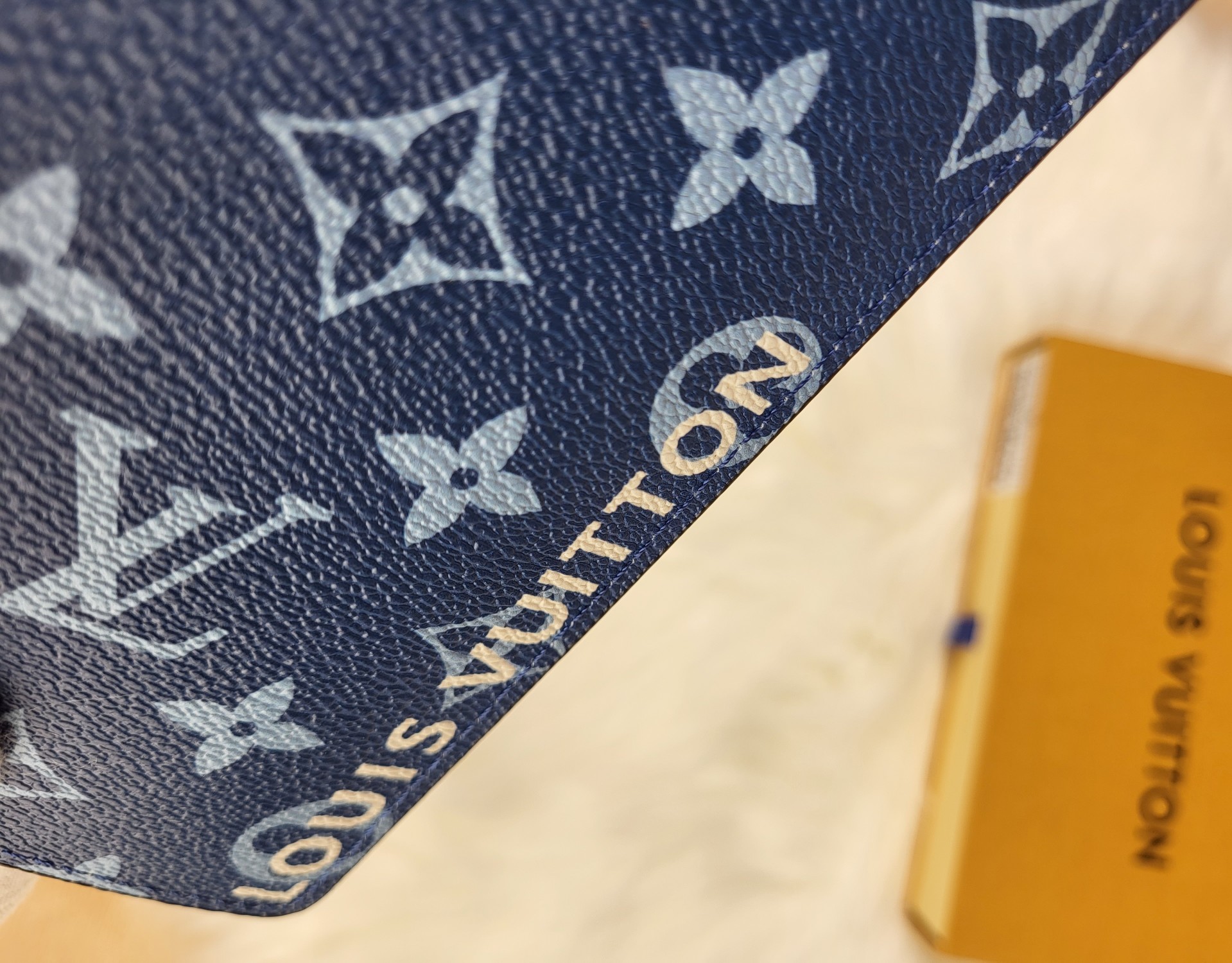 Close-up detail of leather wallet stitching