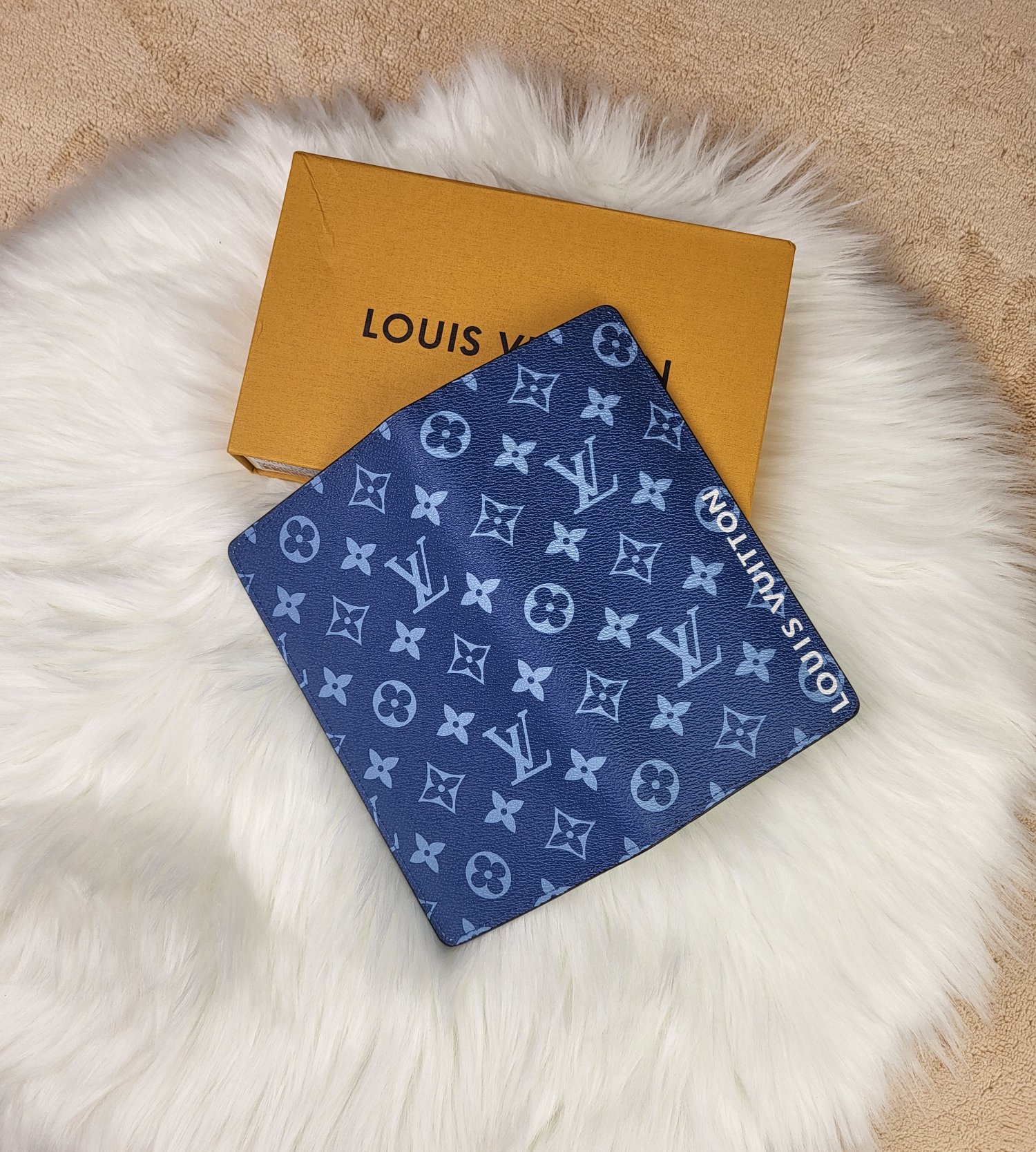 Leather wallet being held