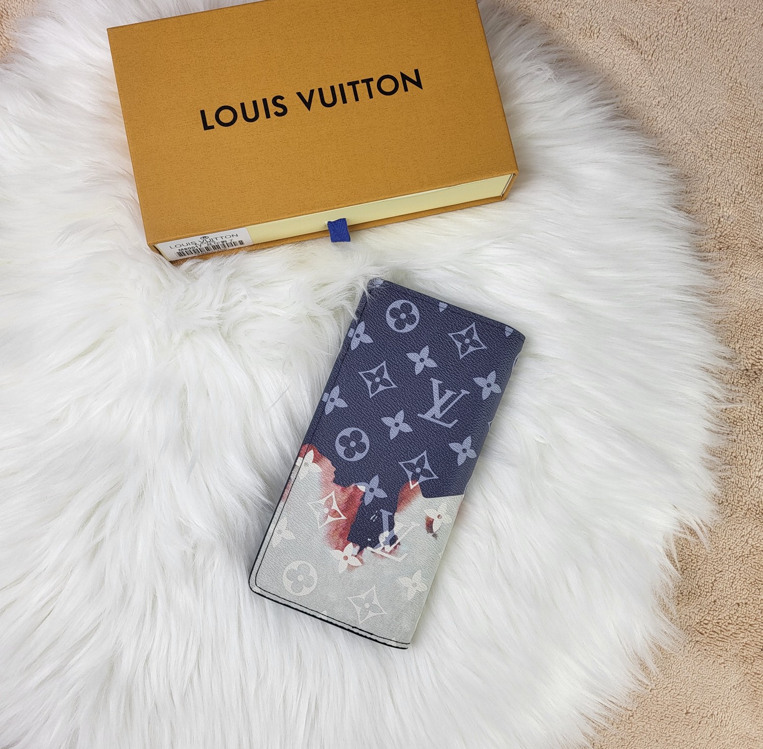 Open leather wallet showing card slots and compartments