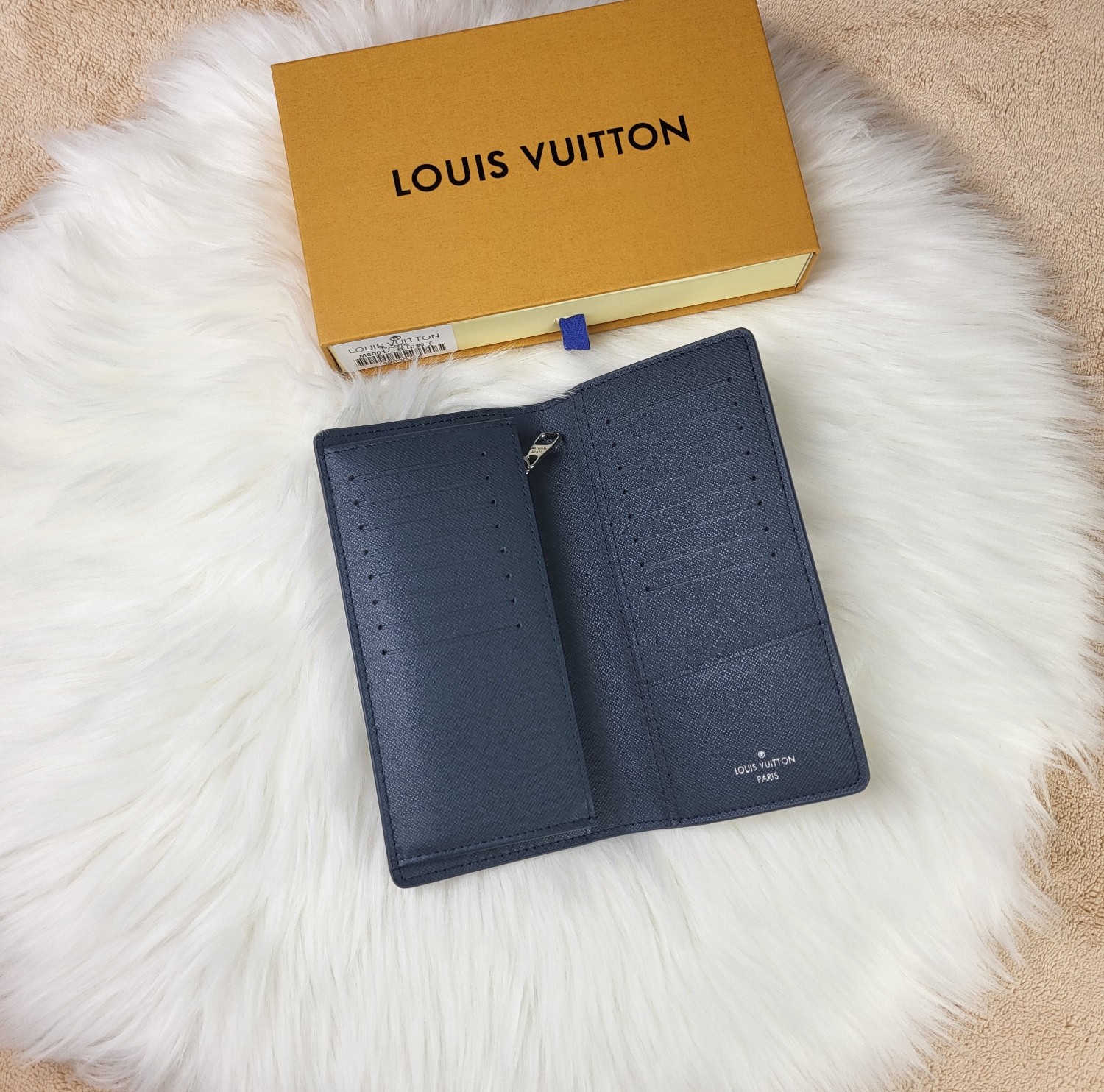 Side profile of slim leather bifold wallet