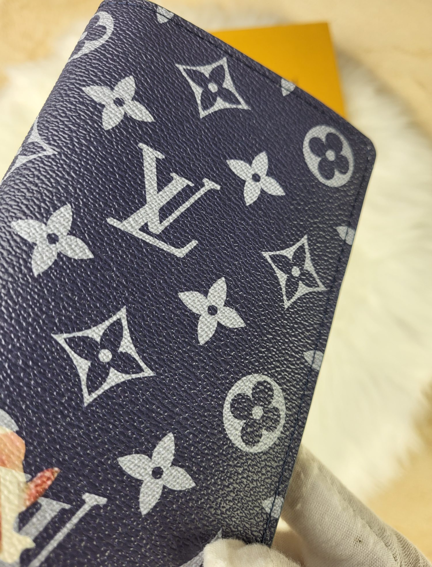 Close-up detail of leather wallet stitching