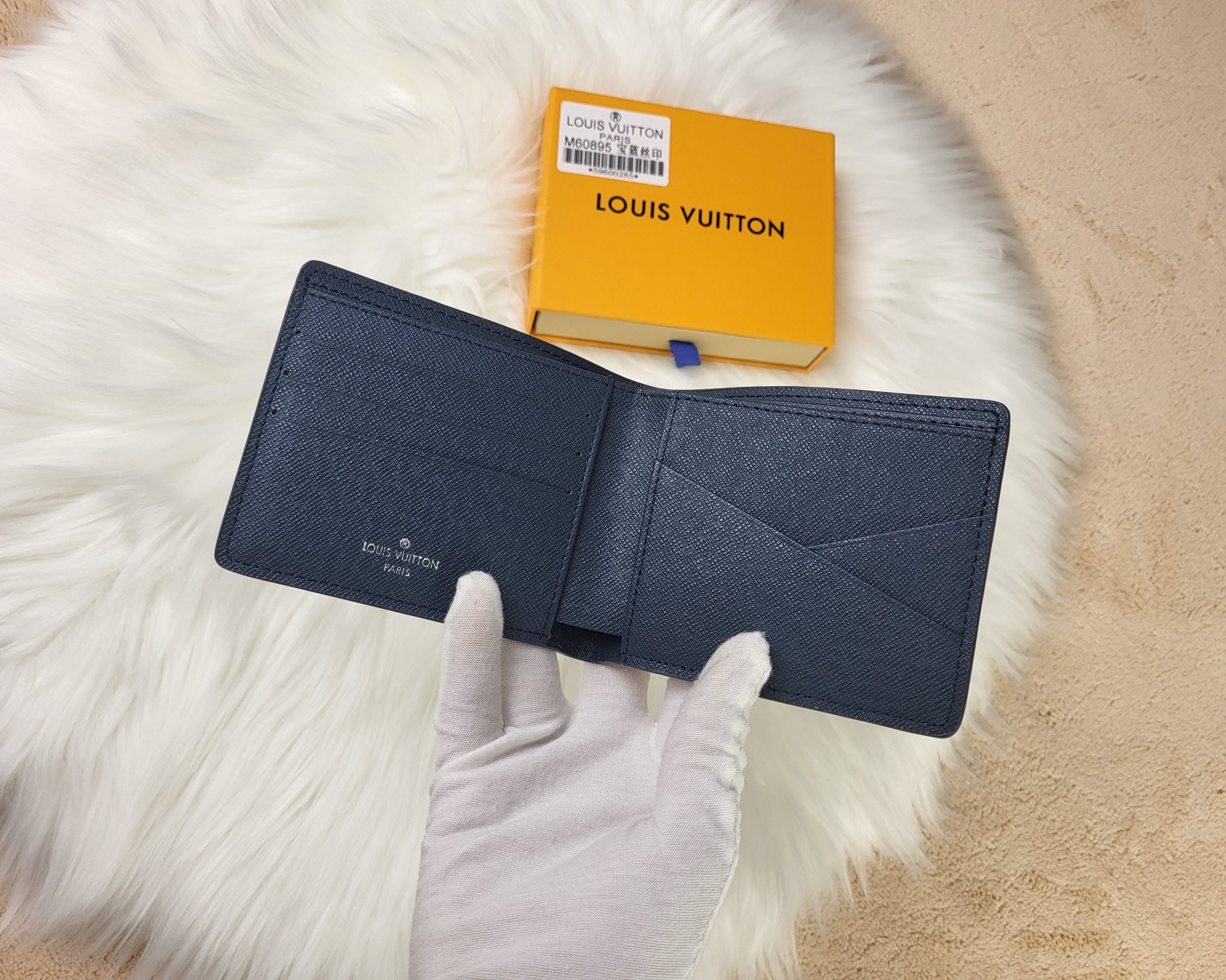 Leather bifold wallet with cards and cash