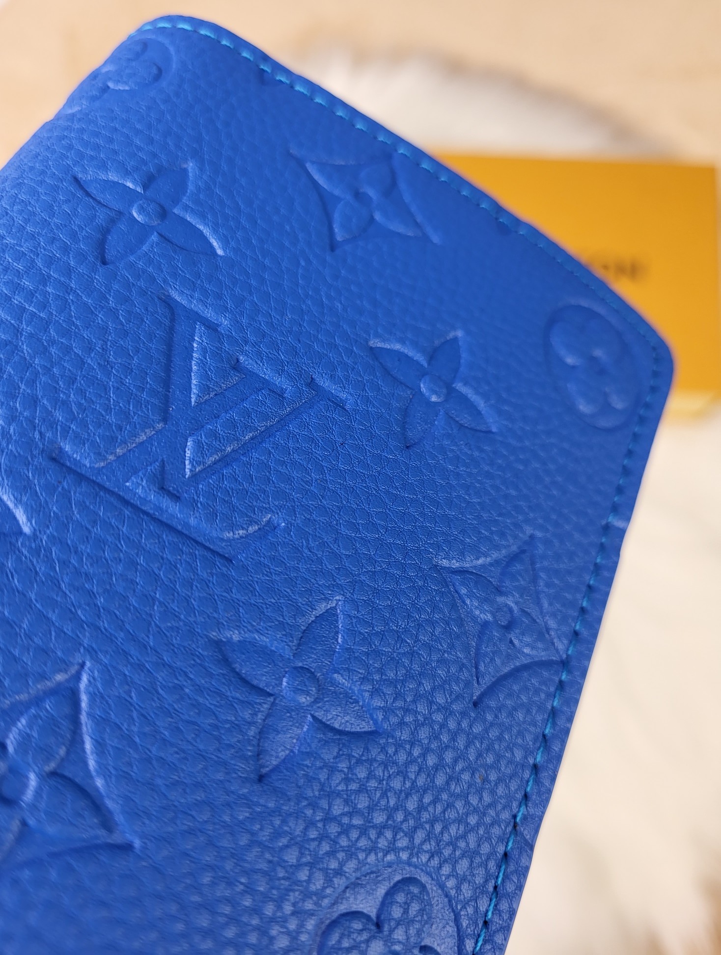 Close-up detail of leather wallet stitching