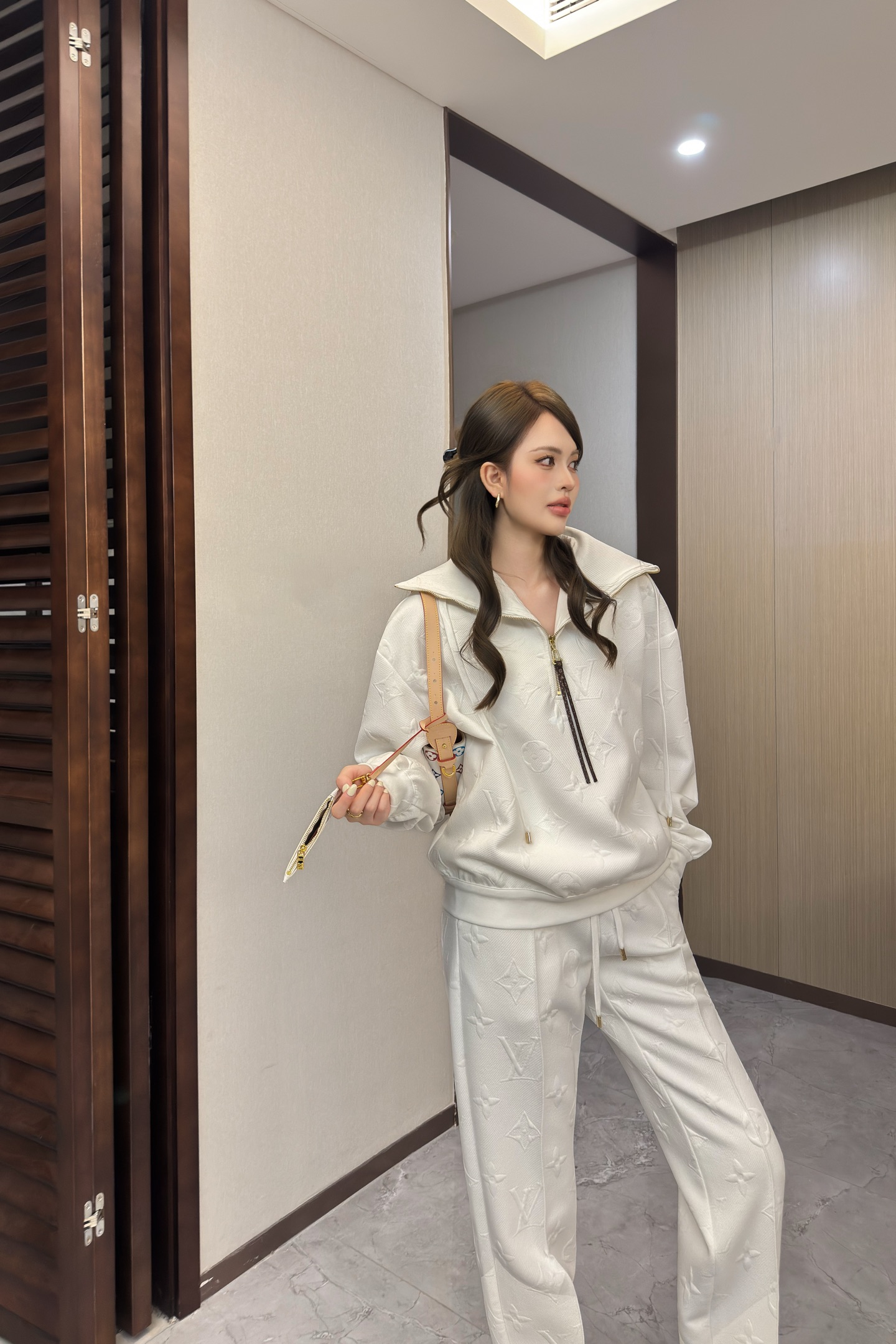 Louis Vuitton Women's White Monogram Embossed Tracksuit Set 2 i1758810832678 1973 0 1