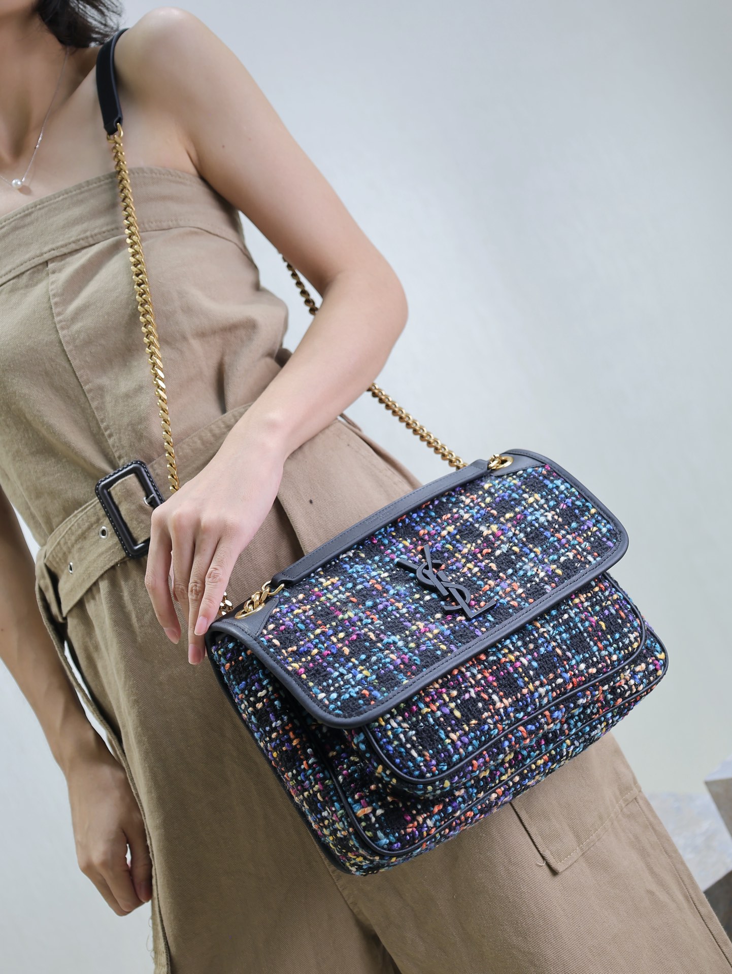 Saint Laurent The tweed fabric looks very solid at first glance