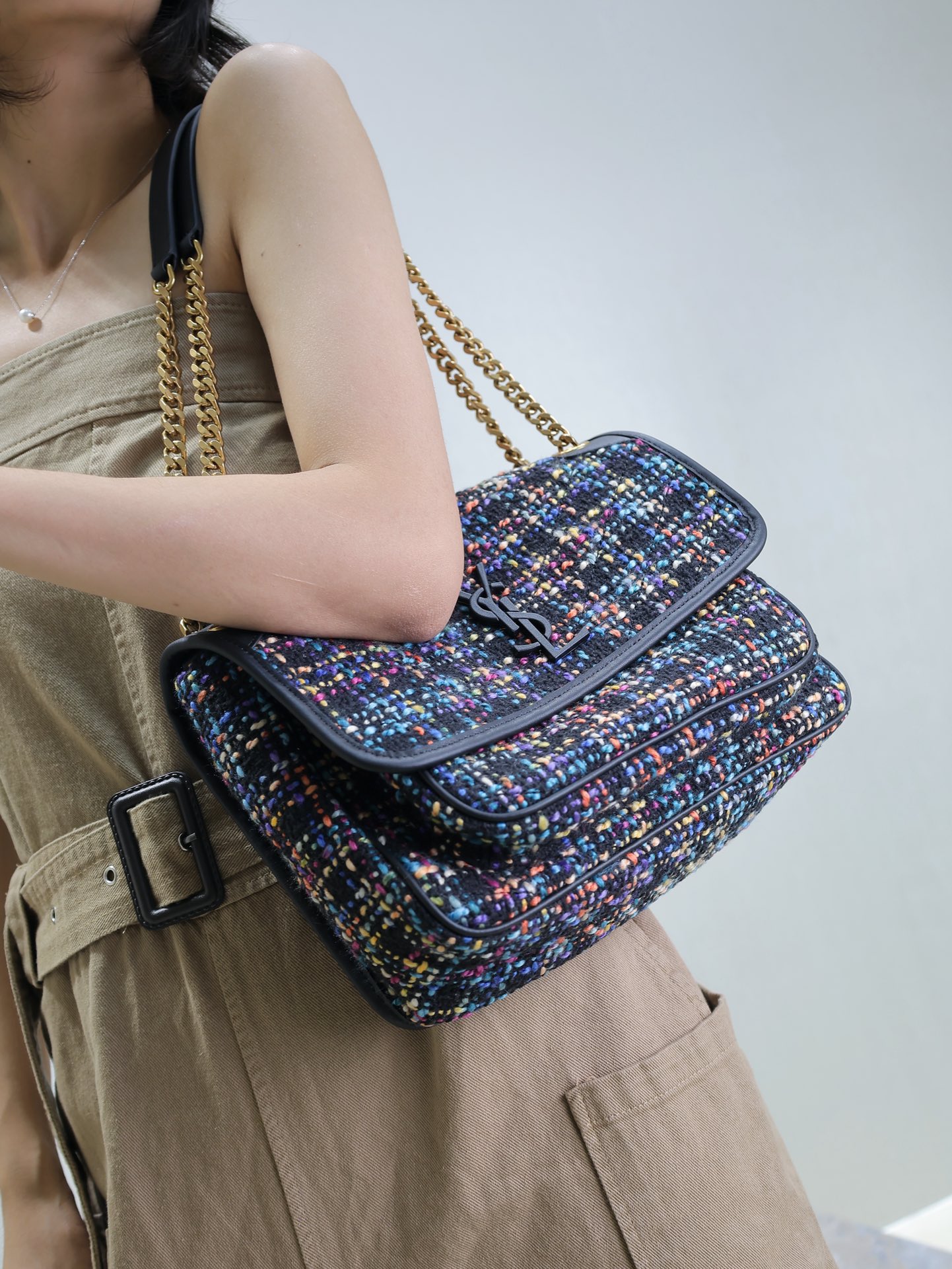 Saint Laurent The tweed fabric looks very solid at first glance