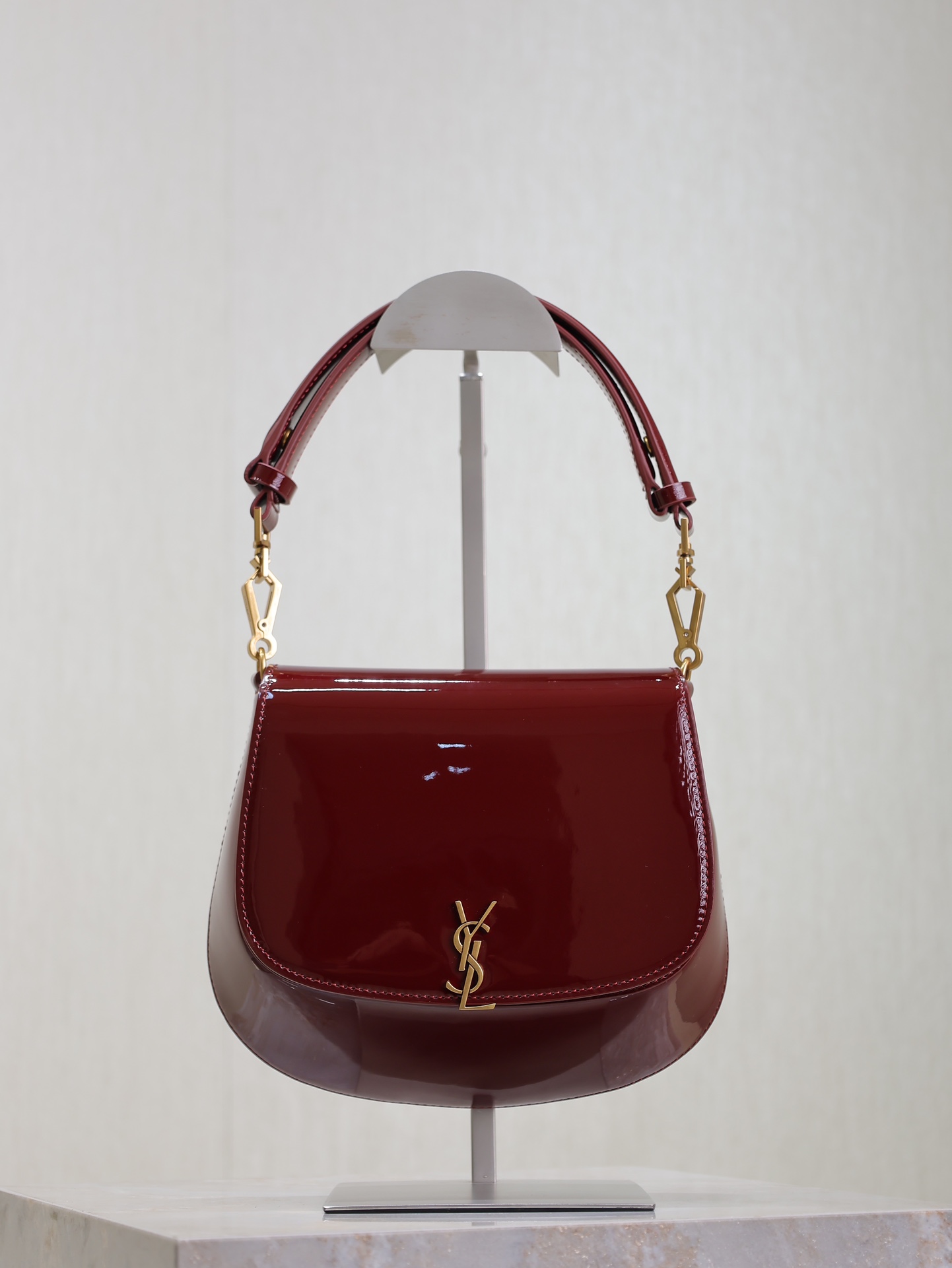 Yves Saint Laurent Crossbody & Shoulder Bags Saddle Bags Maroon Red Calfskin Cowhide Patent Leather Cassandra Underarm