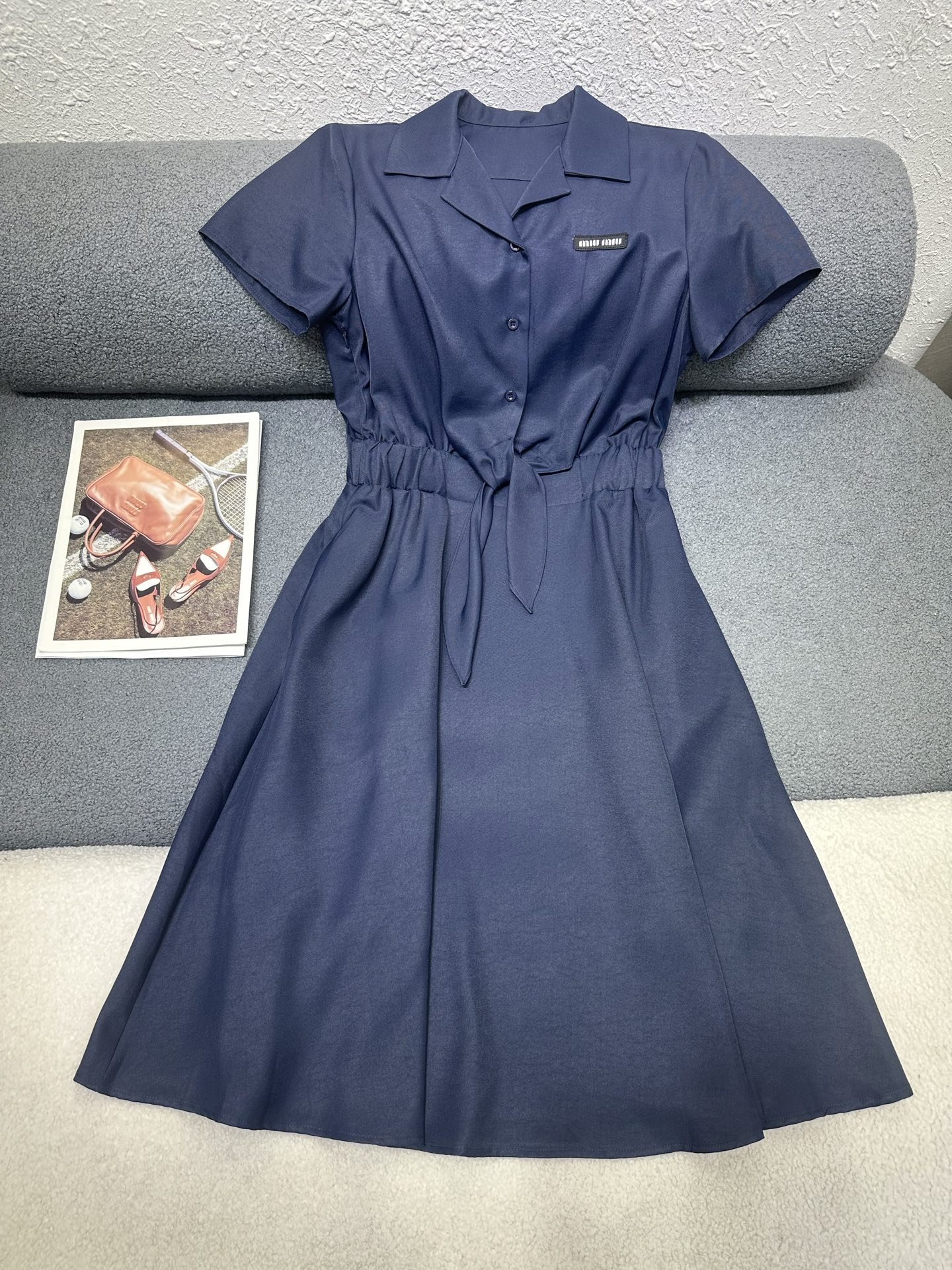 NO:843219,MiuMiu*2026 new summer dress with letter logo and small mark decoration on the chest/waist elastic waist design/simple and elegant version/two colors SML,,miumiu,skirts,19860909MiuMiu*2026夏季新款连衣裙胸前字母logo小标装饰/腰围松紧腰设计/版型简洁大方/两色SML,,miumiu,skirts,,Women's clothing